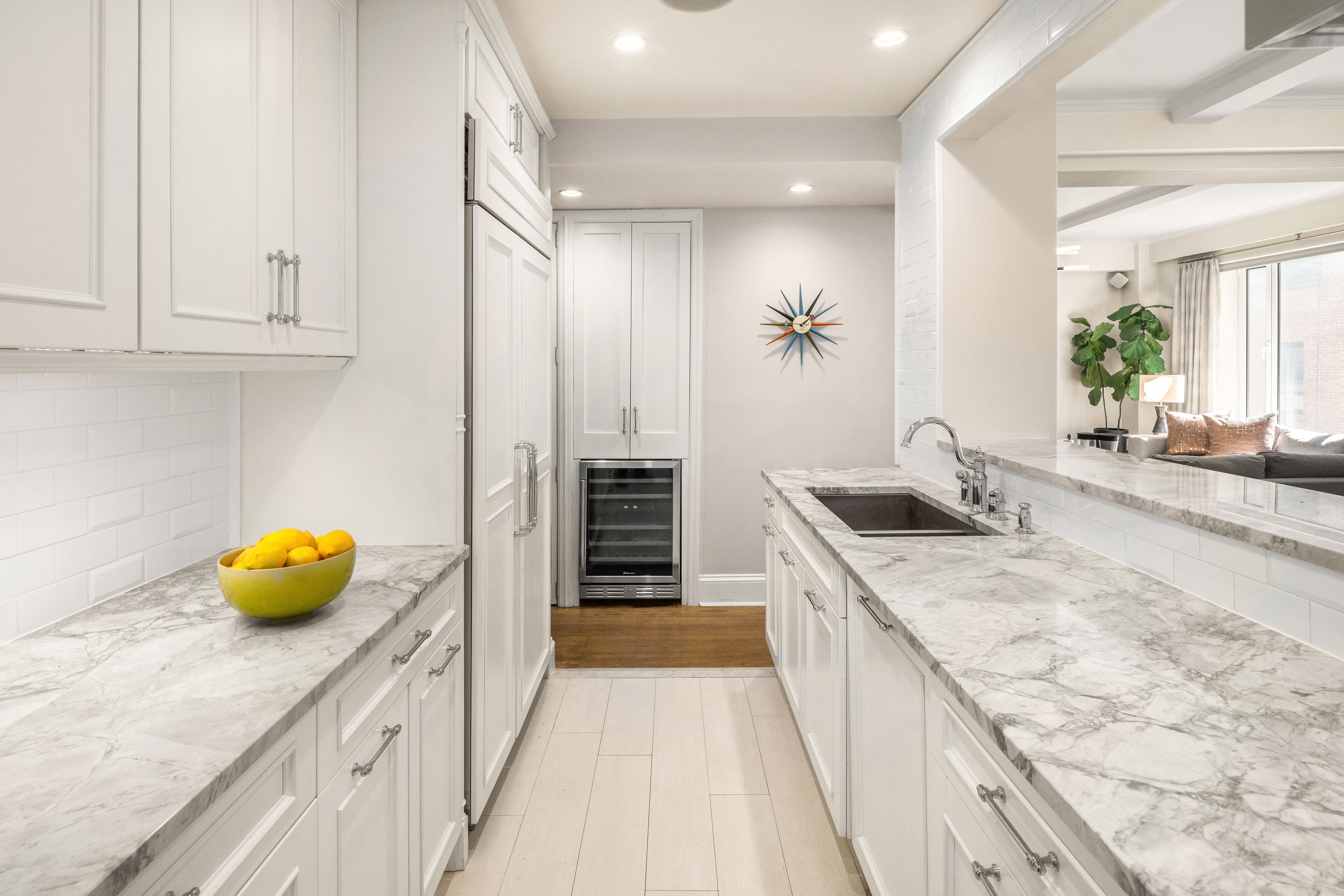 138 East 36th Street, Unit 4C Manhattan, NY 10016 - Photo 7 of 17 a kitchen with a sink and cabinets