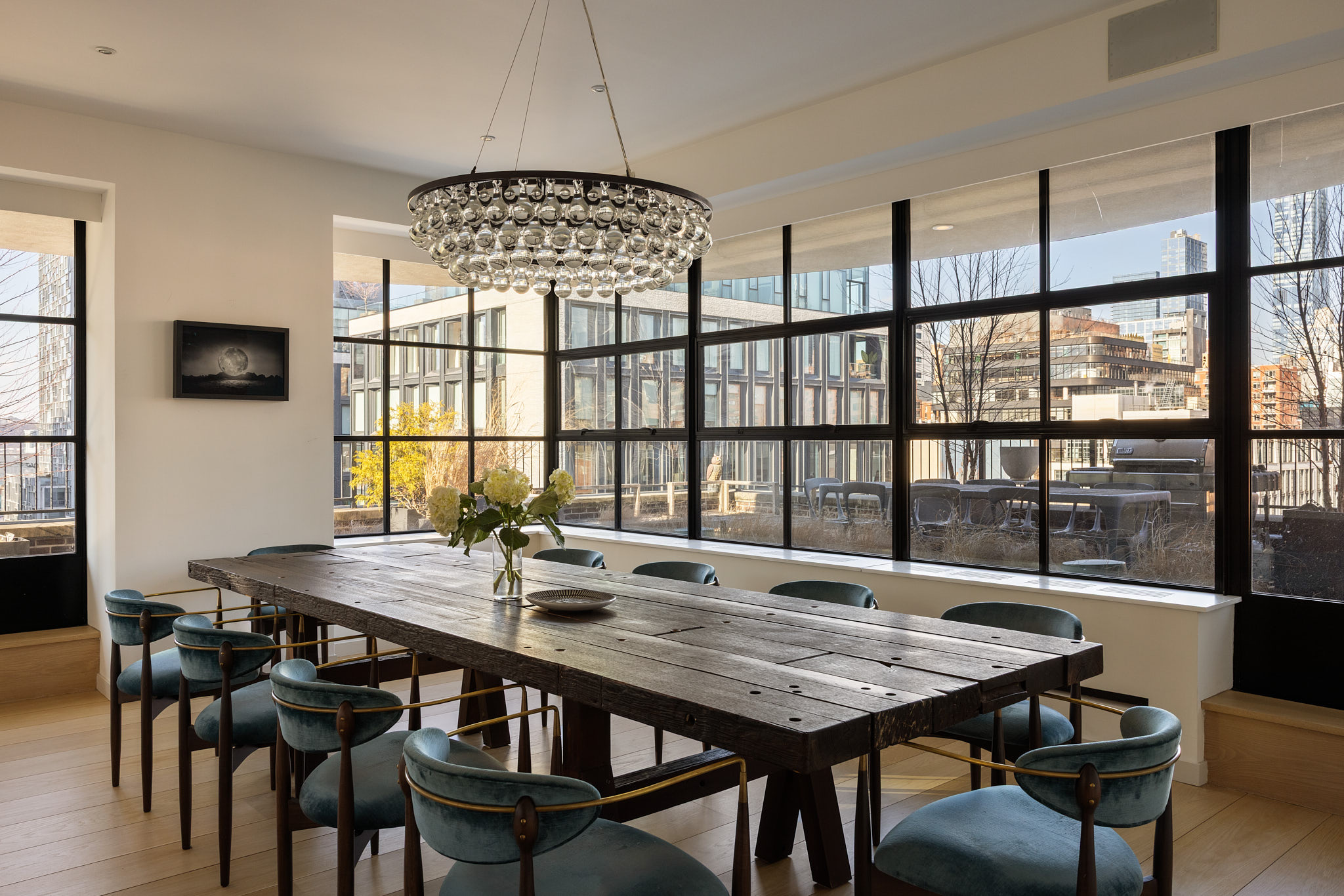456 West 19th Street, Unit PHH Manhattan, NY 10011 - Photo 6 of 21 a view of a dining room with furniture window and outside view
