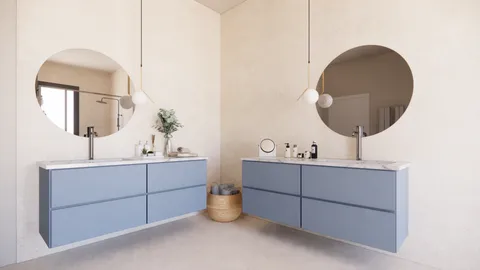 a room with a sink and mirror