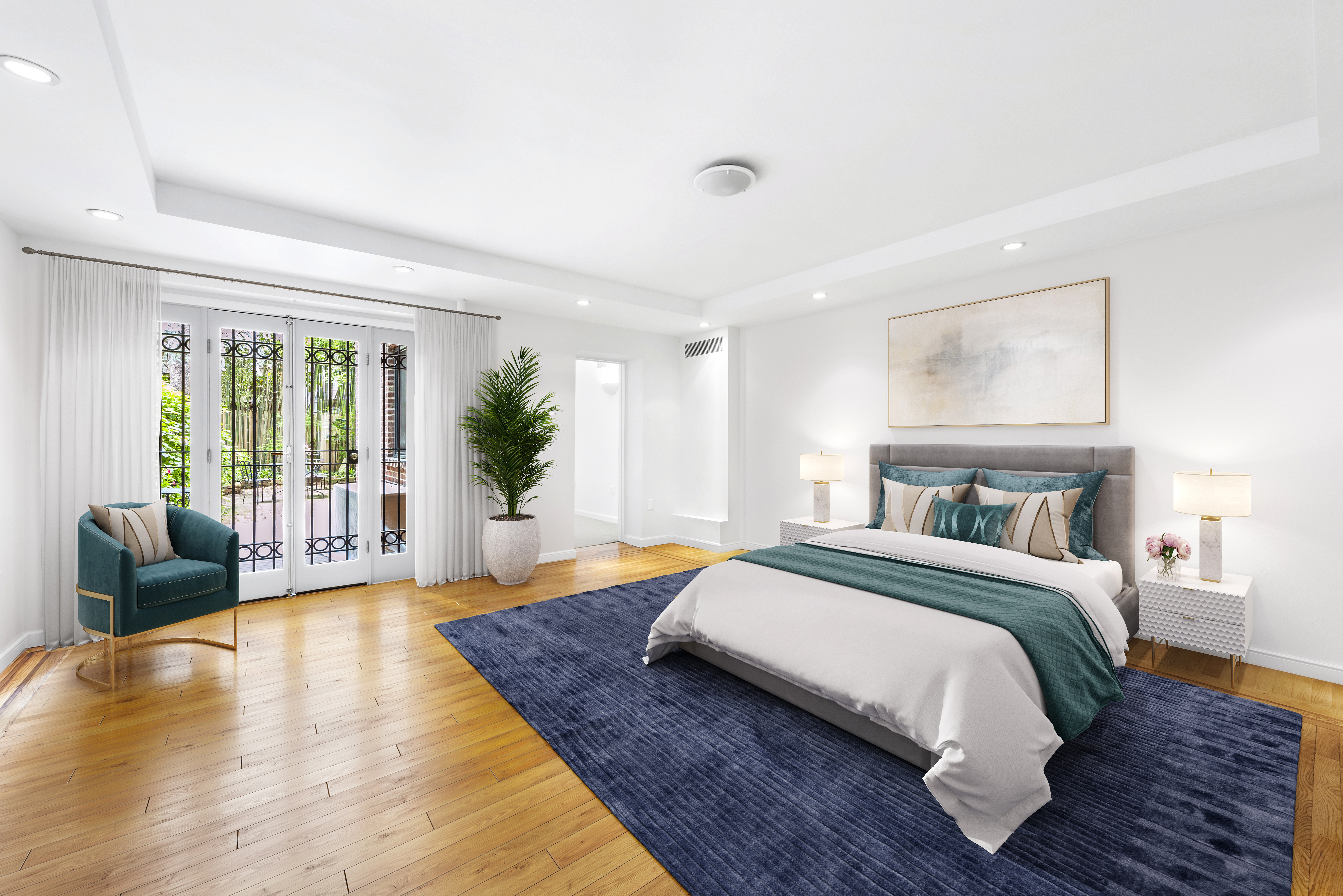 a bedroom with a large bed and a couch