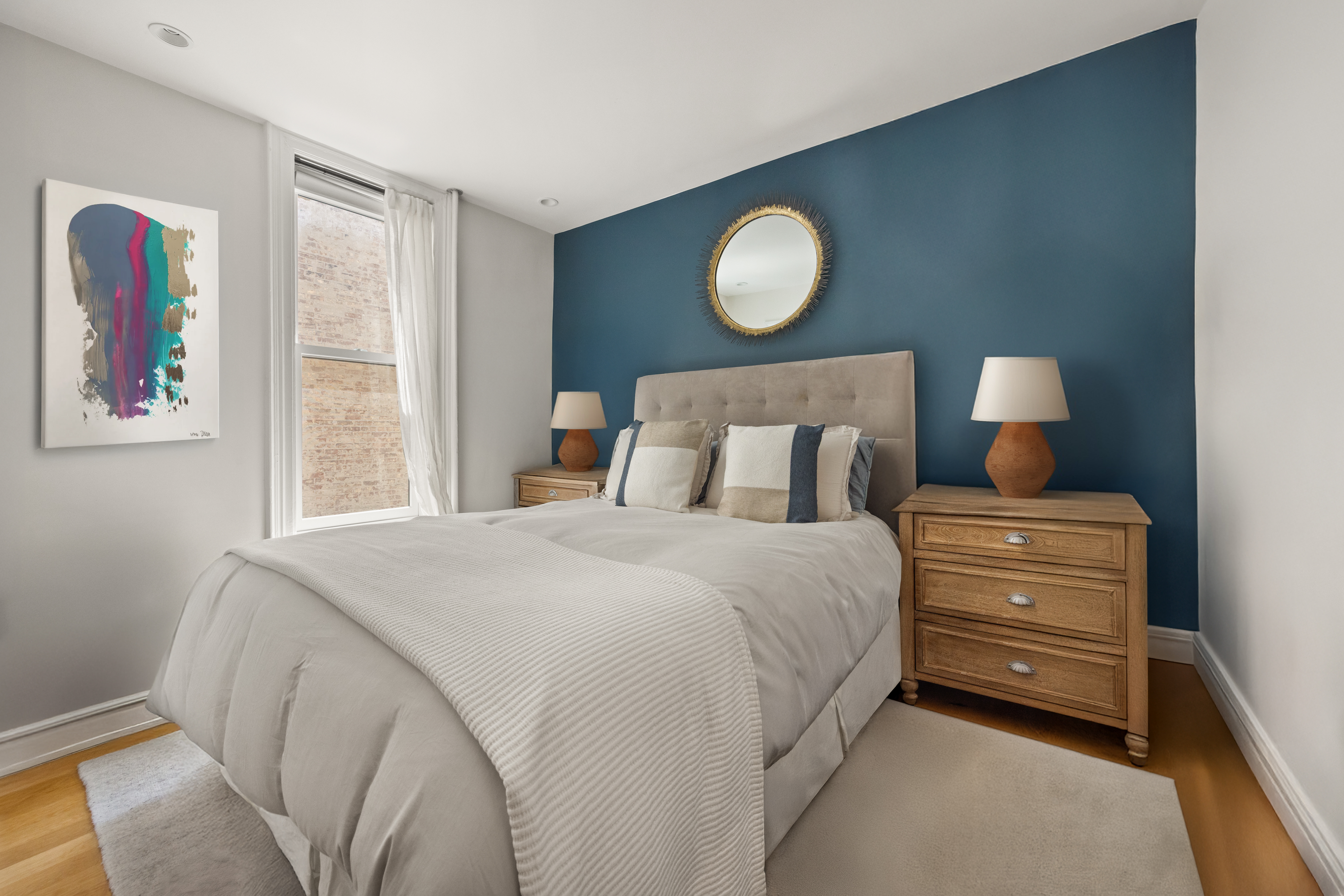 570 7th Street, Unit 3B Brooklyn, NY 11215 - Photo 5 of 9 a bedroom with a bed and wooden floor