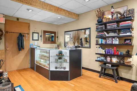 a living room with fireplace furniture and a flat screen tv