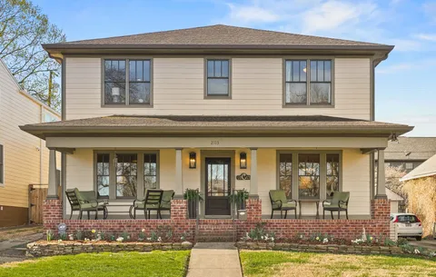 a front view of a house with swimming pool