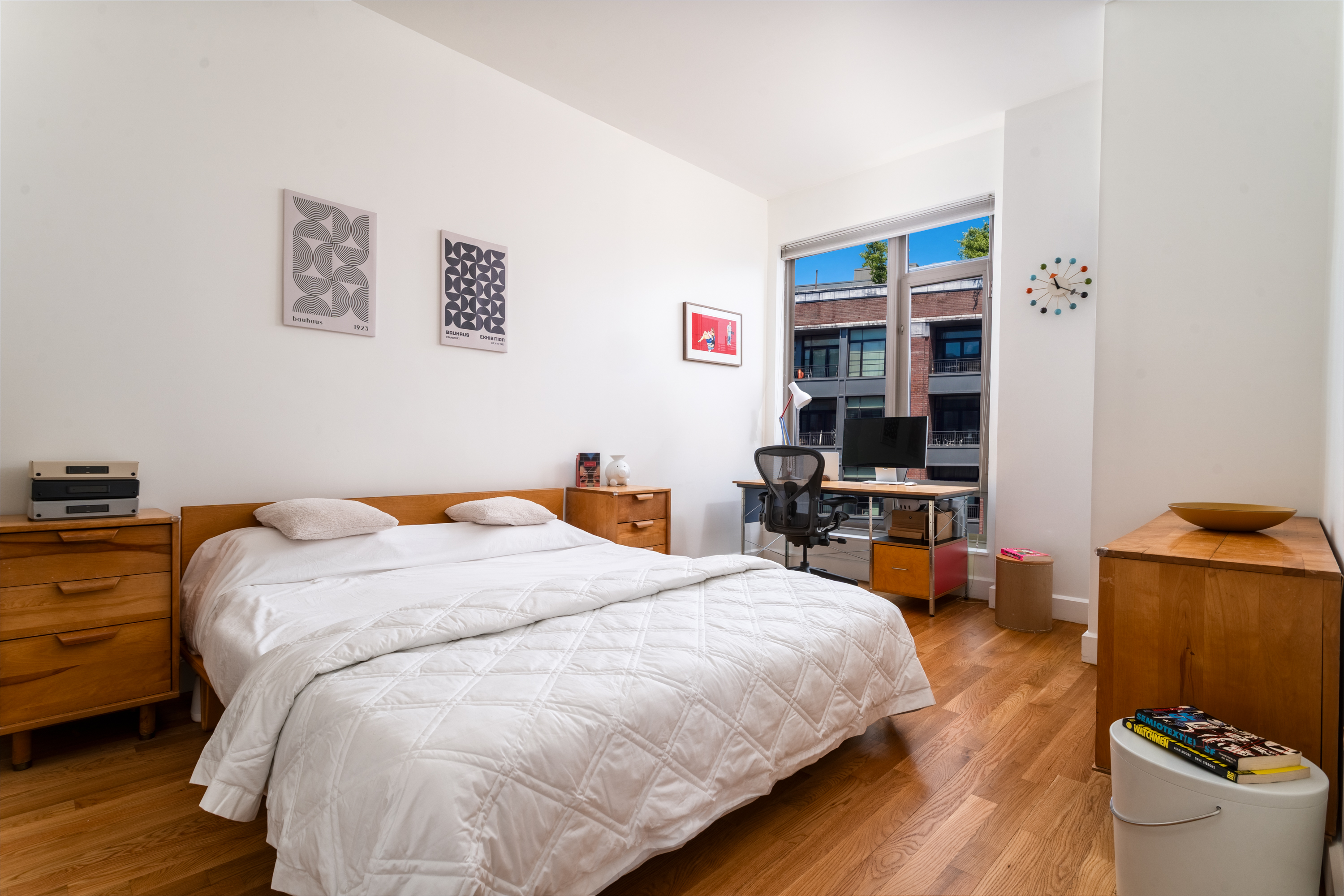 315 Gates Avenue, Unit 4E Brooklyn, NY 11216 - Photo 7 of 17 a bed room with a bed and a chair