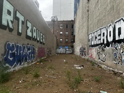 a view of a street with buildings