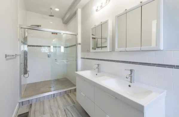 a view of hallway with wooden floor