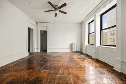 a view of an empty room and window