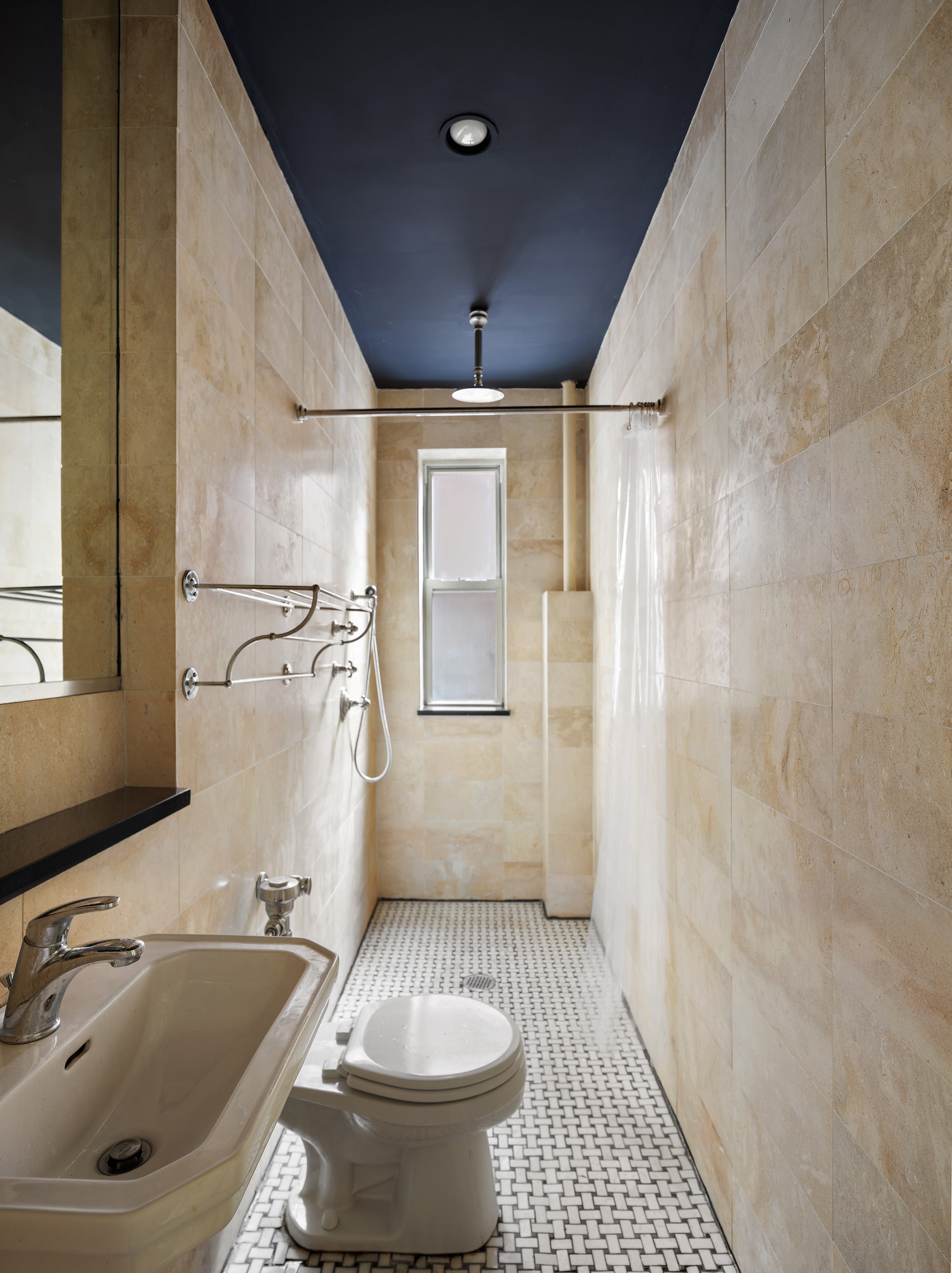 25 Charles Street, Unit 3B Manhattan, NY 10014 - Photo 7 of 9 a bathroom with a sink a toilet and shower