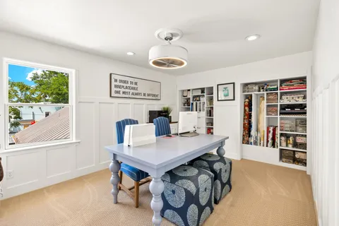 a view of entryway livingroom and hall