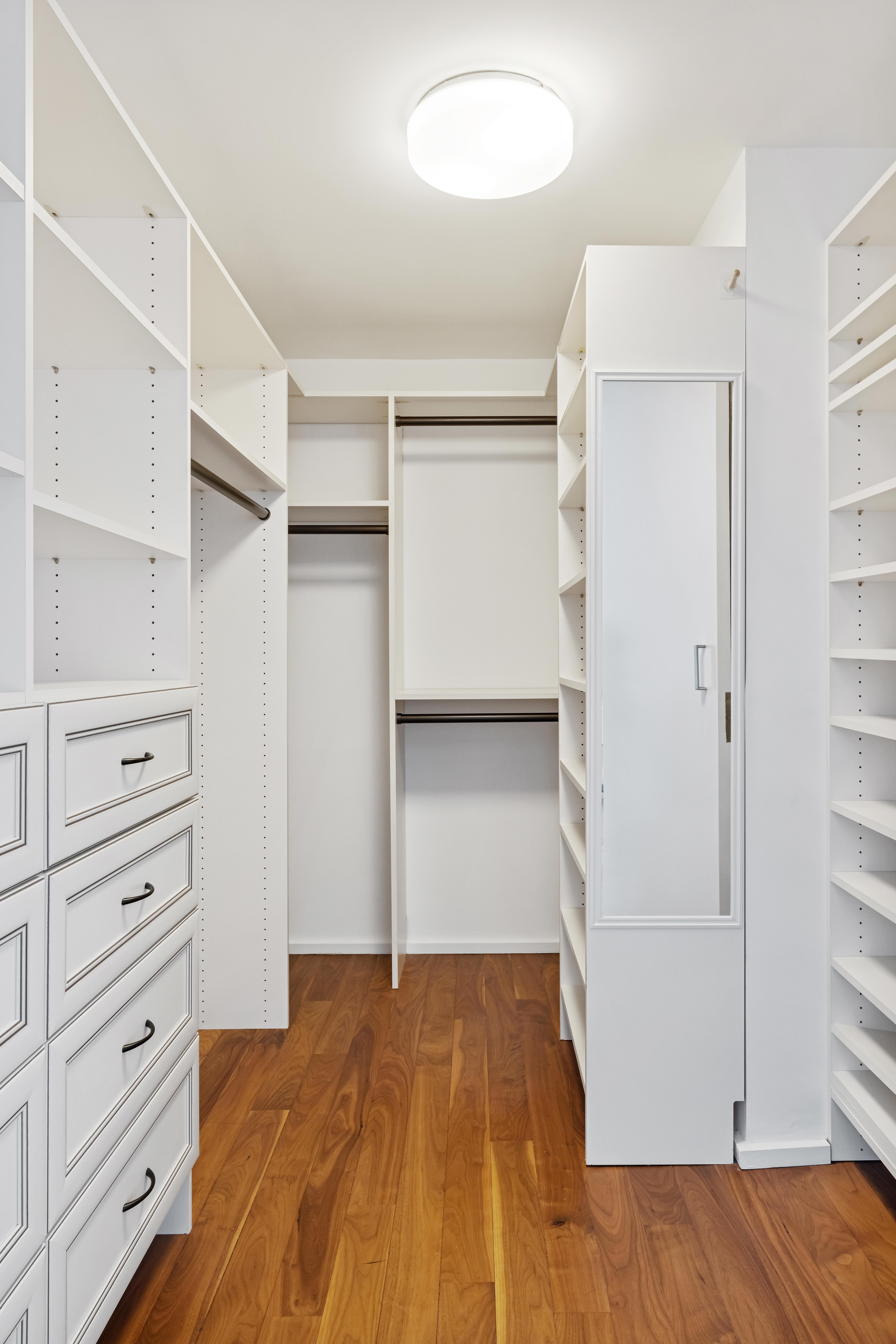 515 East 72nd Street, Unit 40E Manhattan, NY 10021 - Photo 11 of 34 a view of walk in closet with empty racks