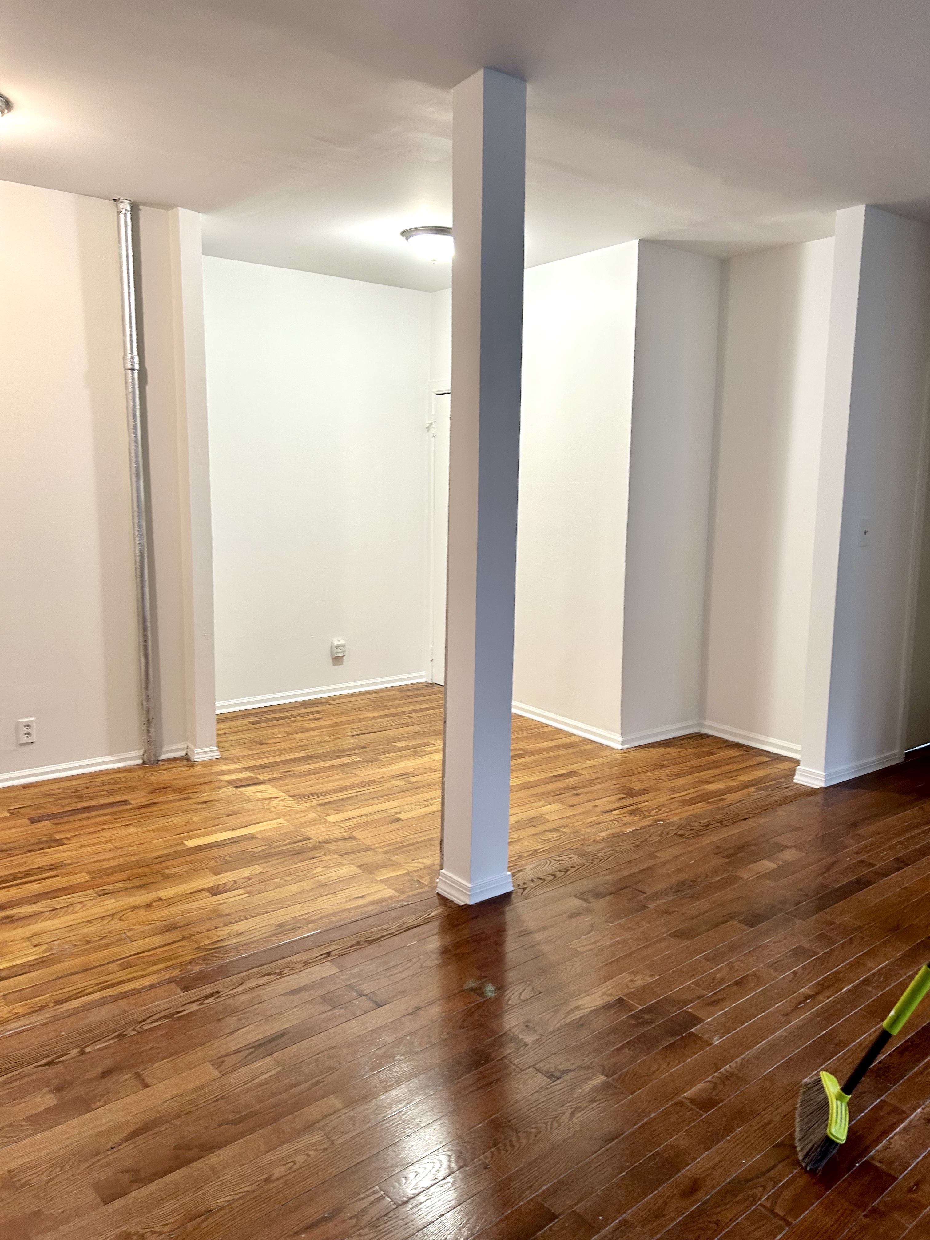 570 Jefferson Avenue, Unit 4 Brooklyn, NY 11221 - Photo 7 of 8 a view of a room with wooden floor