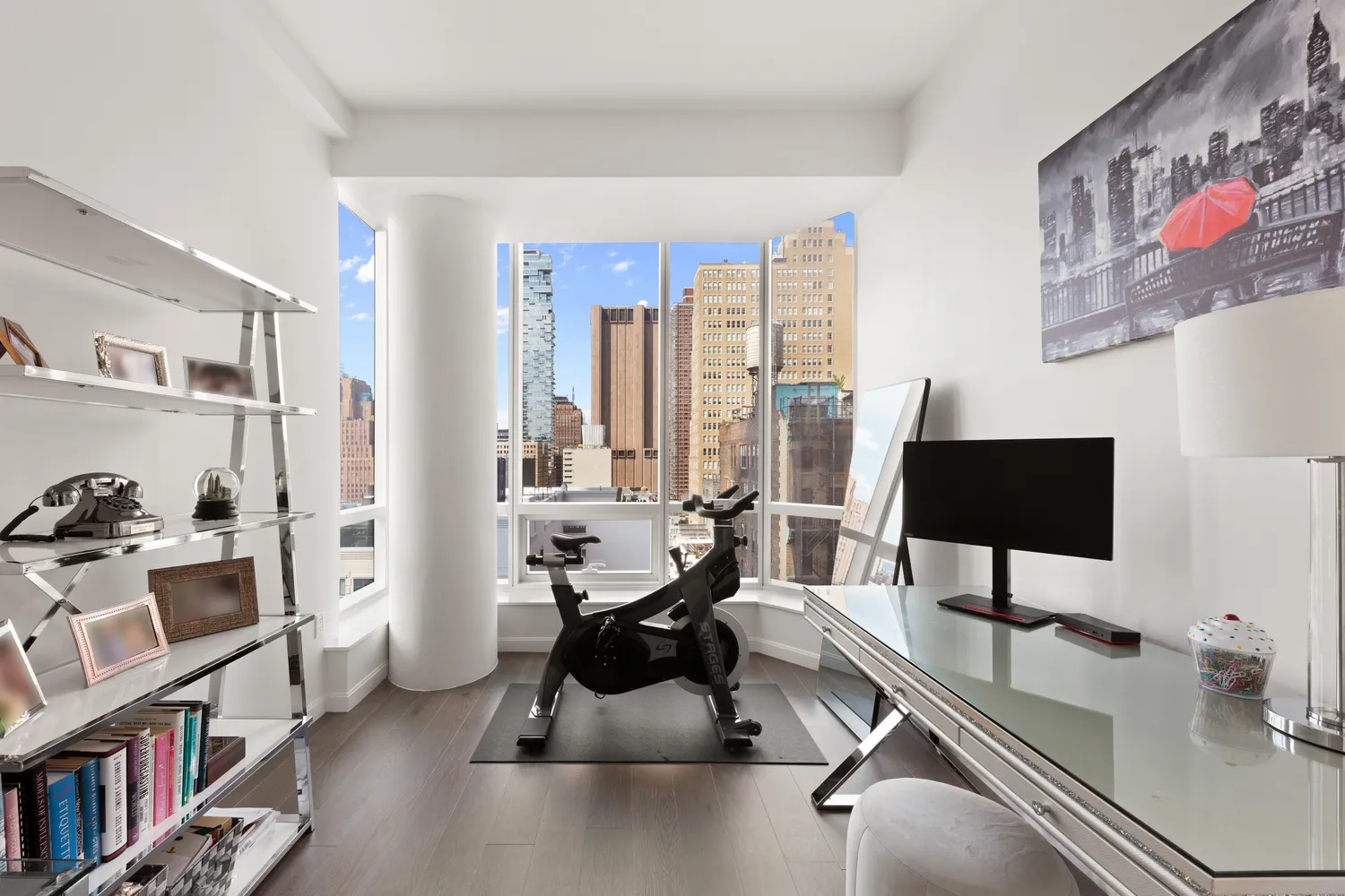 a room with furniture a rug and a window