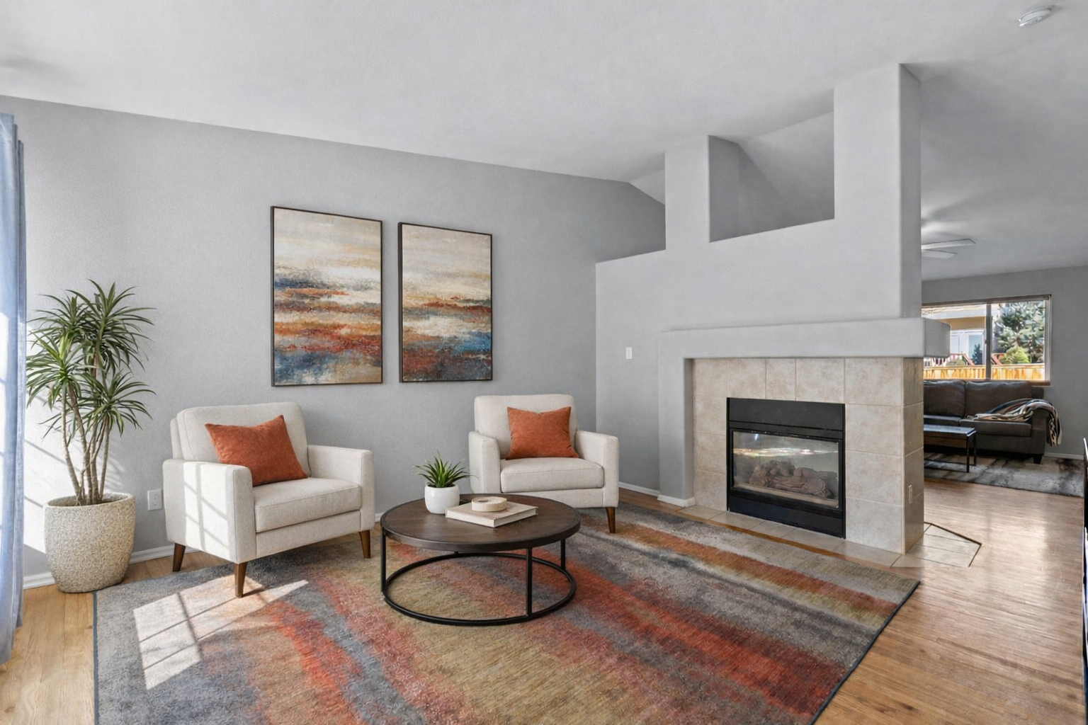 847 Timbervale Trail Highlands Ranch, CO 80129 - Photo 4 of 36 a living room with furniture and a fireplace