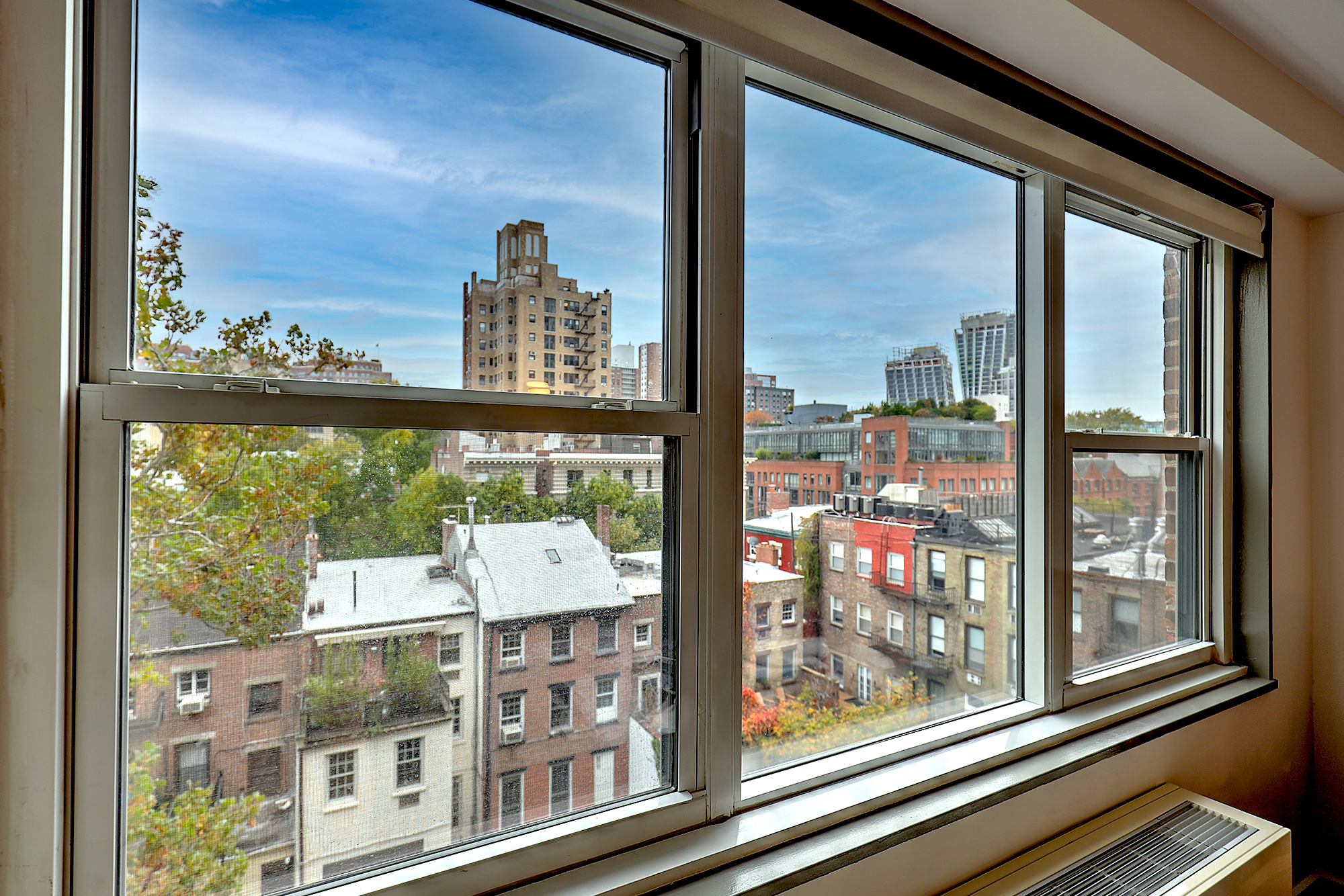 360 West 22nd Street, Unit 7P Manhattan, NY 10011 - Photo 4 of 13 a view of a glass door with a glass door