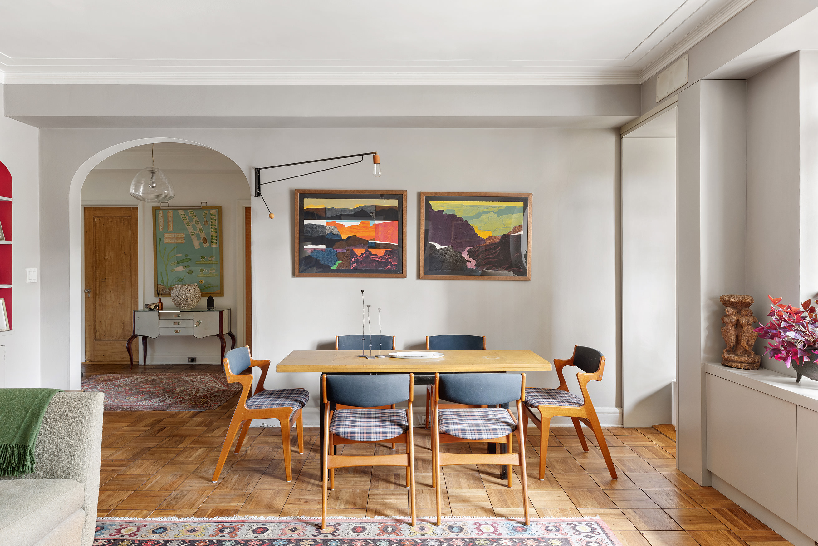 25 Central Park West, Unit 11C Manhattan, NY 10023 - Photo 2 of 17 a living room with furniture and a potted plant
