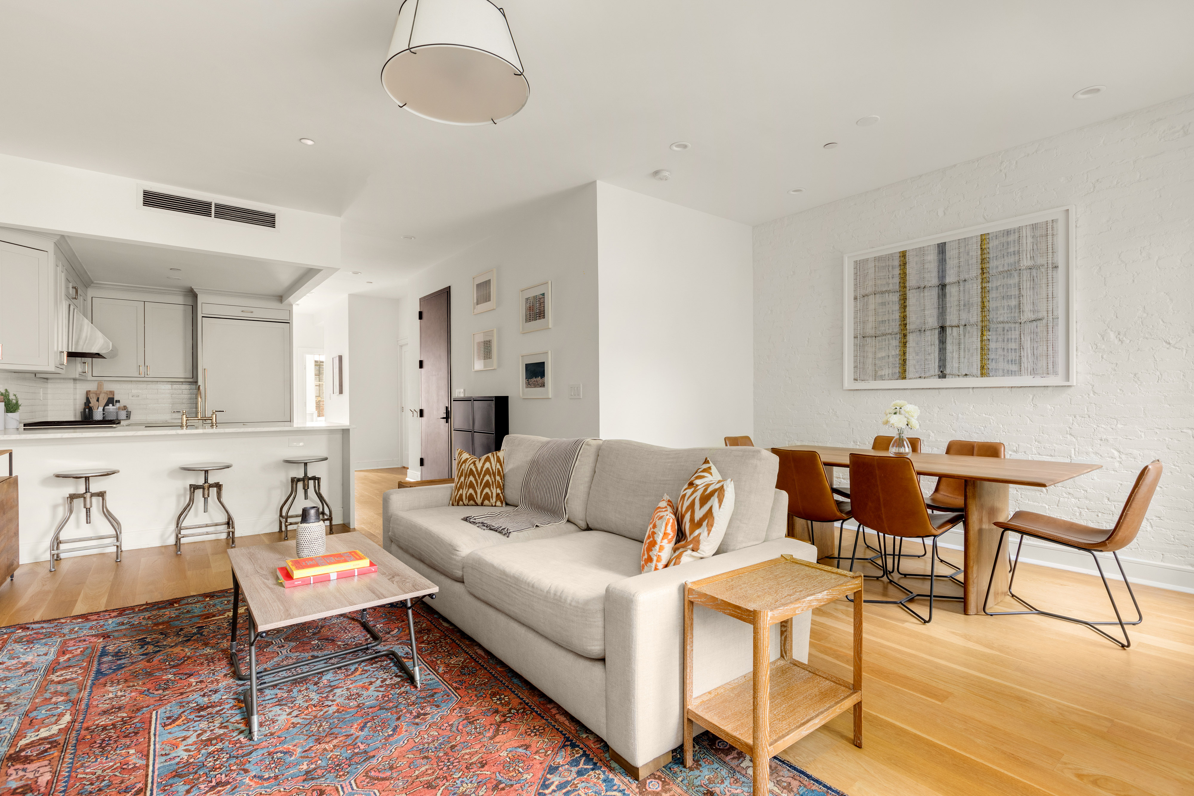 352 6th Avenue, Unit 3 Brooklyn, NY 11215 - Photo 5 of 14 a living room with furniture and a wooden floor