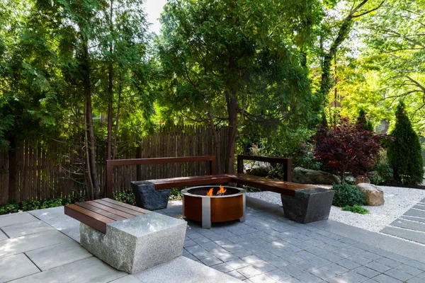 a view of a patio with table and chairs