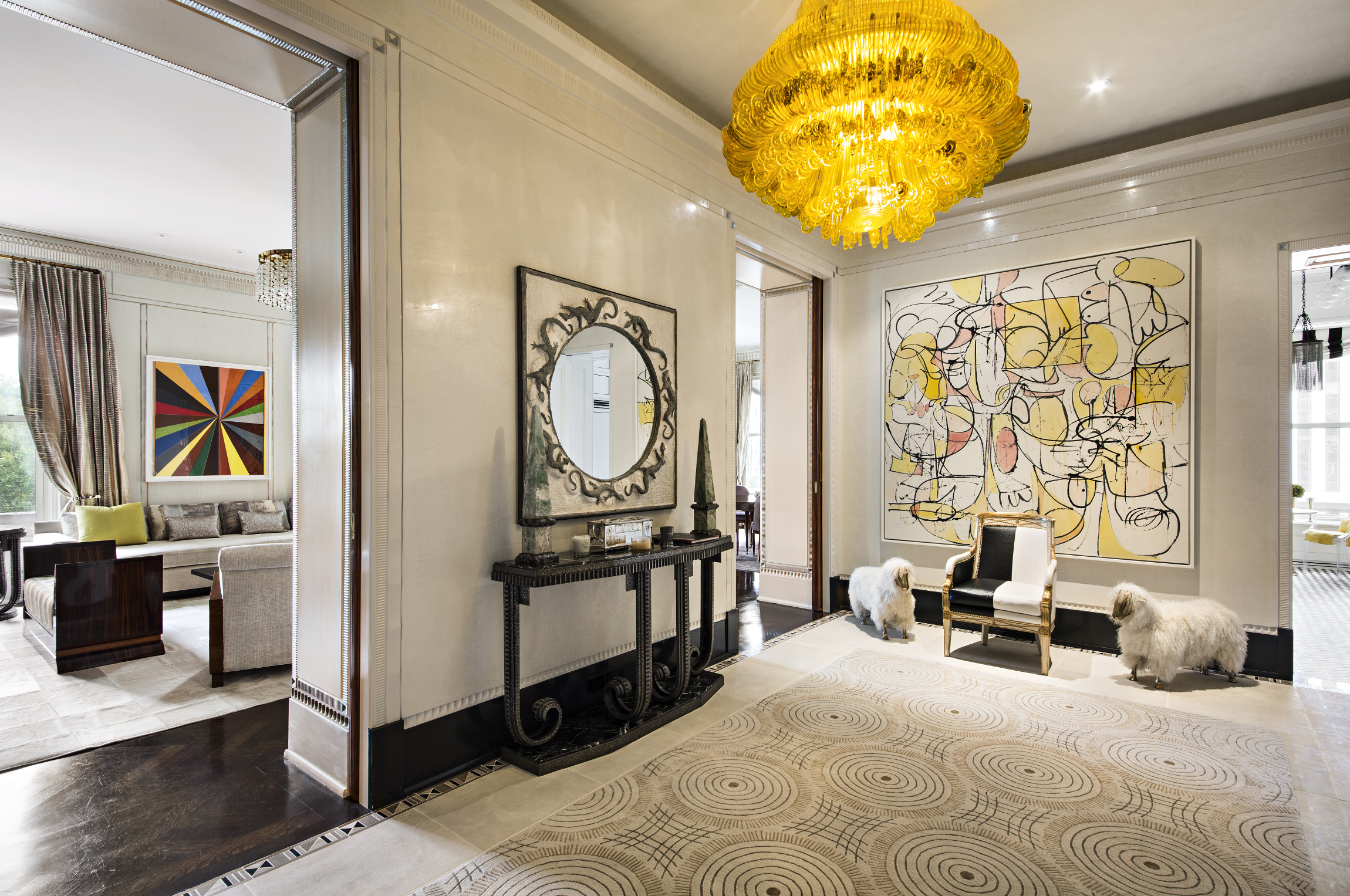 1 Central Park South, Unit 409 Manhattan, NY 10019 - Photo 4 of 26 a bedroom with a bed a painting on the wall and a potted plant