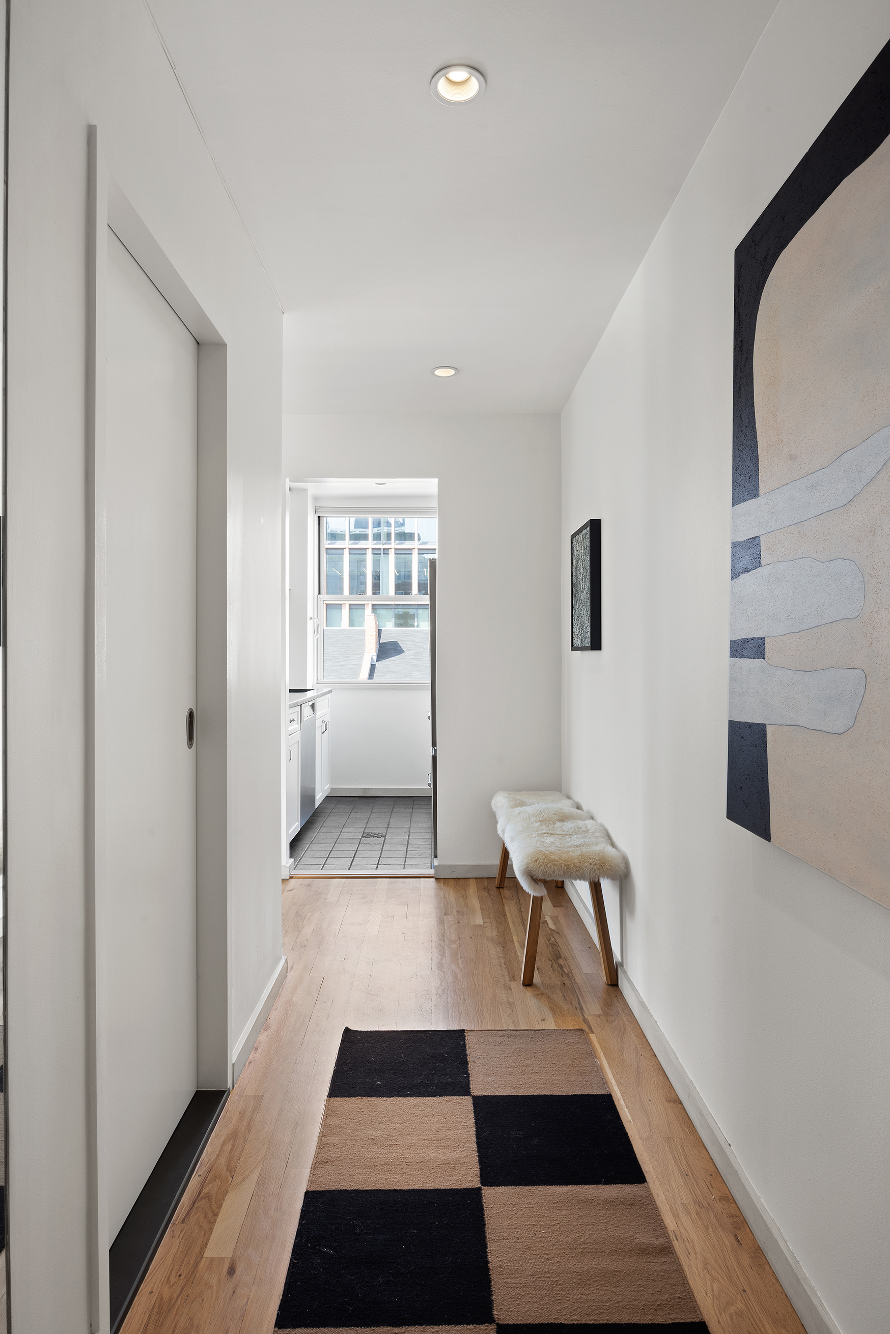 350 West 14th Street, Unit 6D Manhattan, NY 10014 - Photo 11 of 16 a room with furniture and a rug