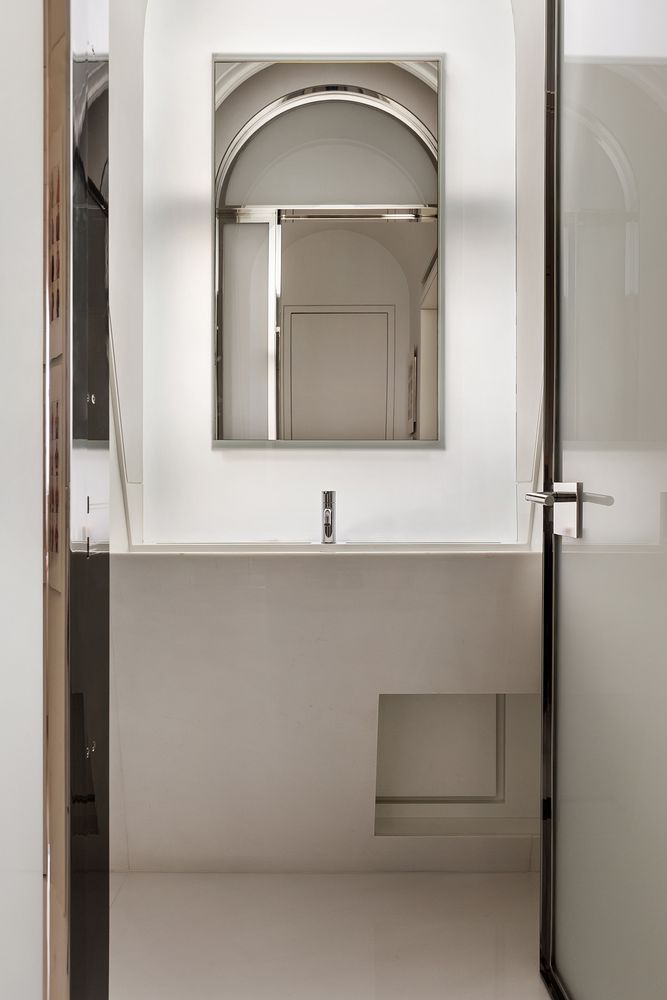 a bathroom with a bathtub and a sink