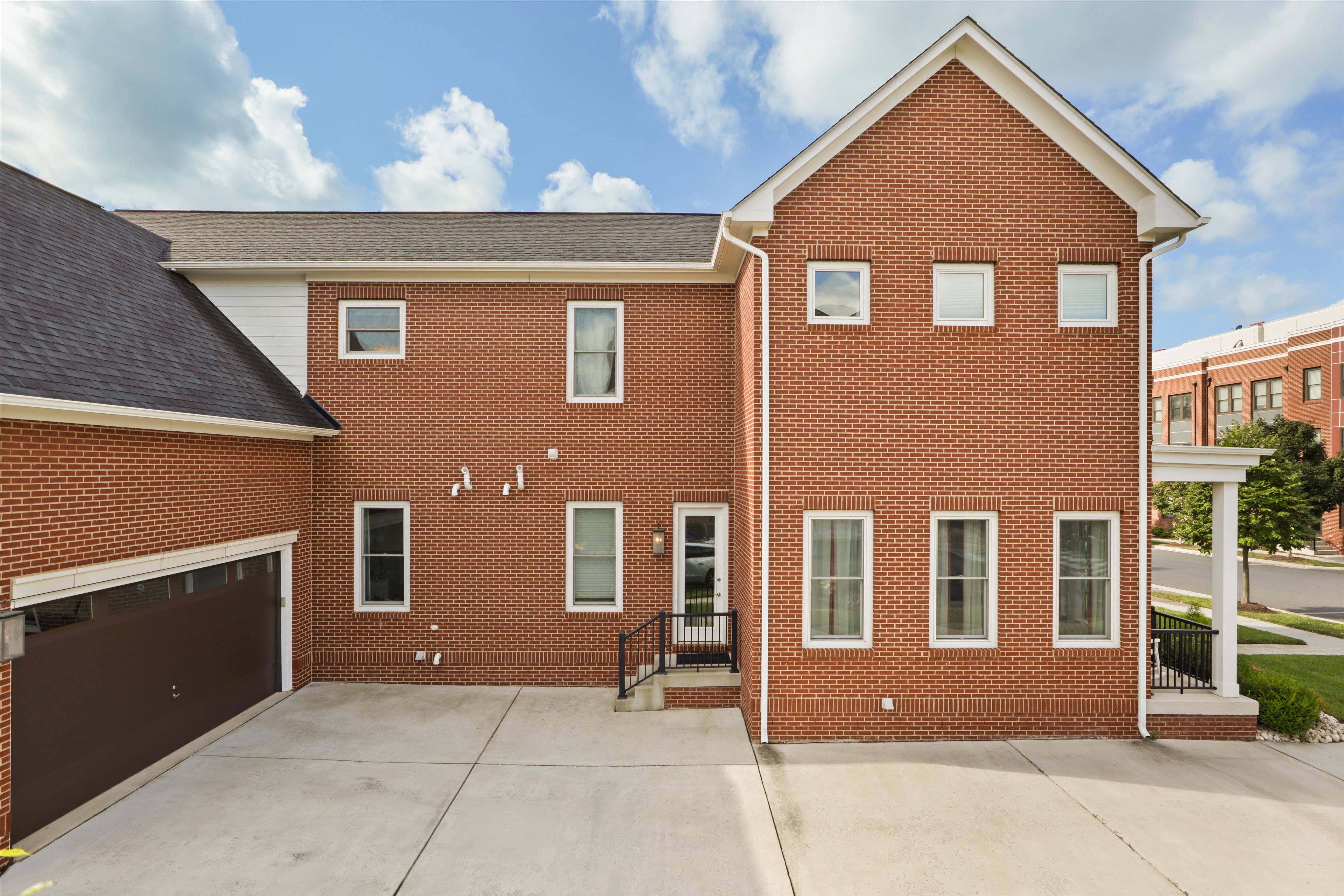 9101 Power House Road Lorton, VA 22079 - Photo 5 of 75 a front view of a house with a garage