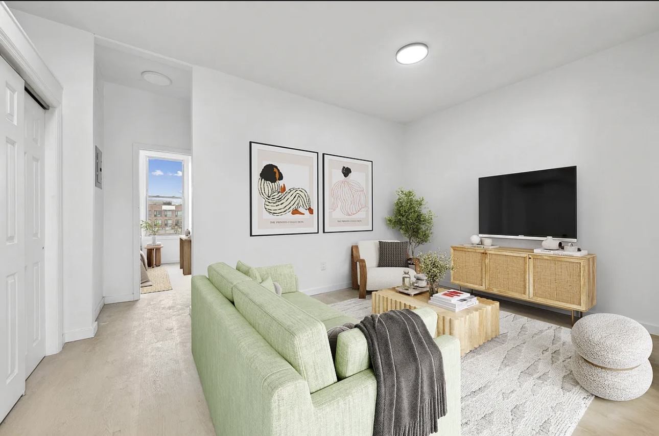 131 20th Street, Unit 2 Brooklyn, NY 11232 - Photo 2 of 7 a living room with furniture and a flat screen tv