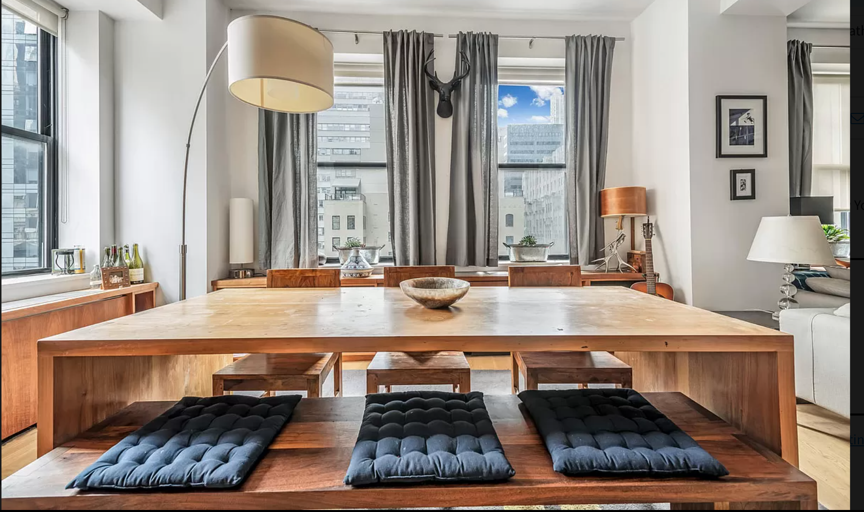 71 Nassau Street, Unit 12C Manhattan, NY 10038 - Photo 7 of 18 a bathroom with a sink and a mirror