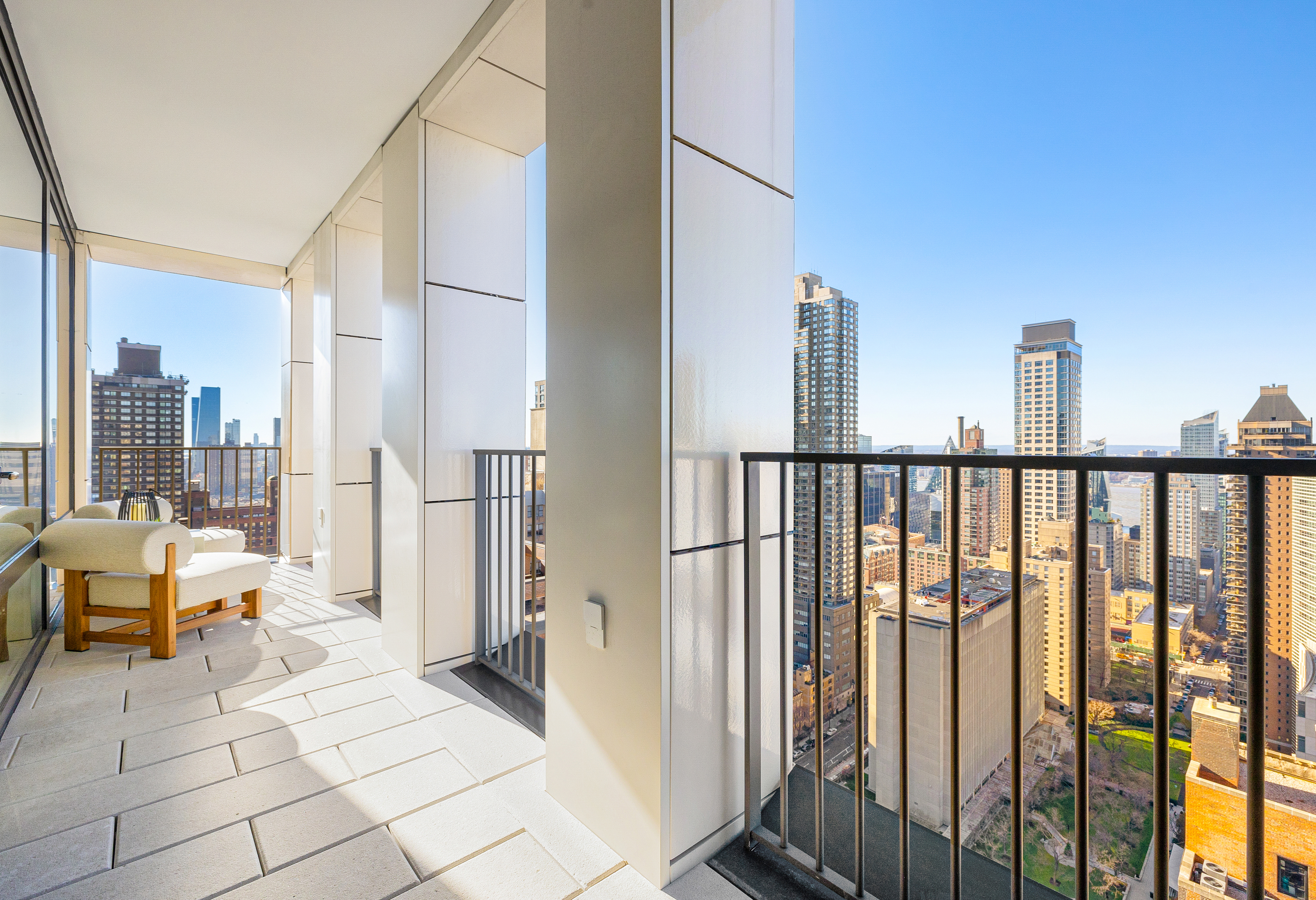 15 West 61st Street, Unit PH1C Manhattan, NY 10023 - Photo 23 of 26 a view of a balcony with wooden floor