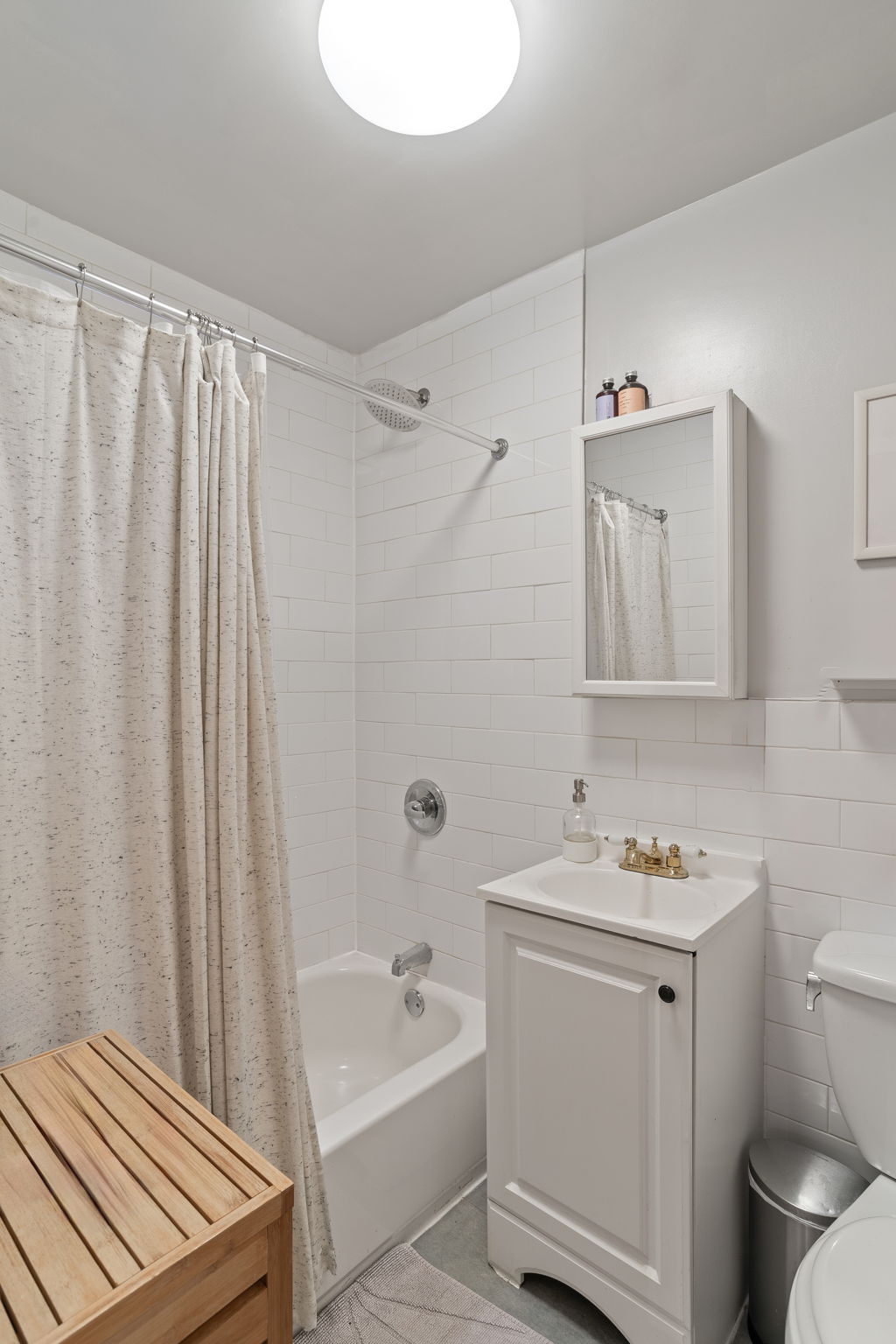 43 Underhill Avenue, Unit B2 Brooklyn, NY 11238 - Photo 9 of 10 a bathroom with a sink a toilet and shower