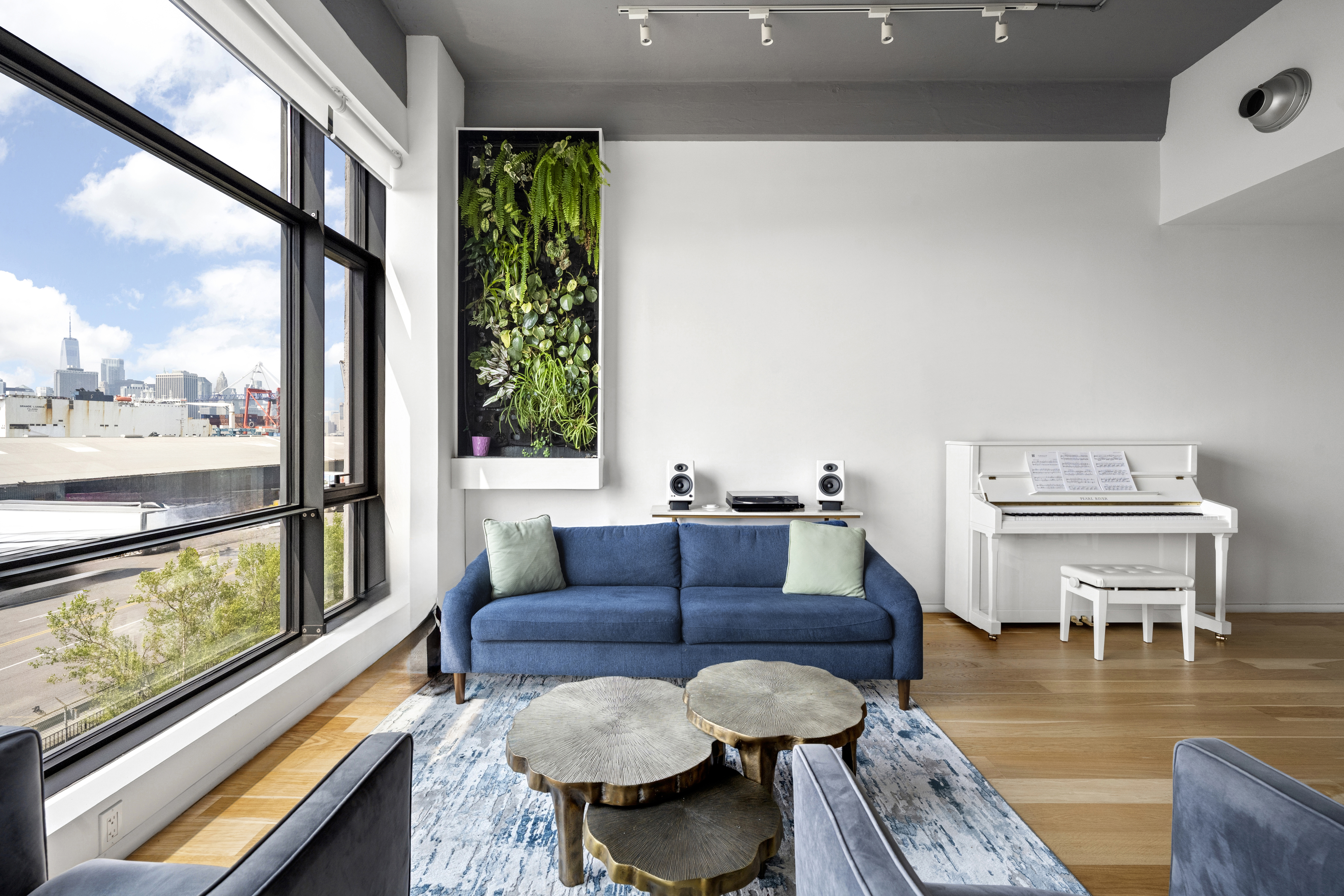 160 Imlay Street, Unit 3B3 Brooklyn, NY 11231 - Photo 3 of 14 a living room with furniture and a large window
