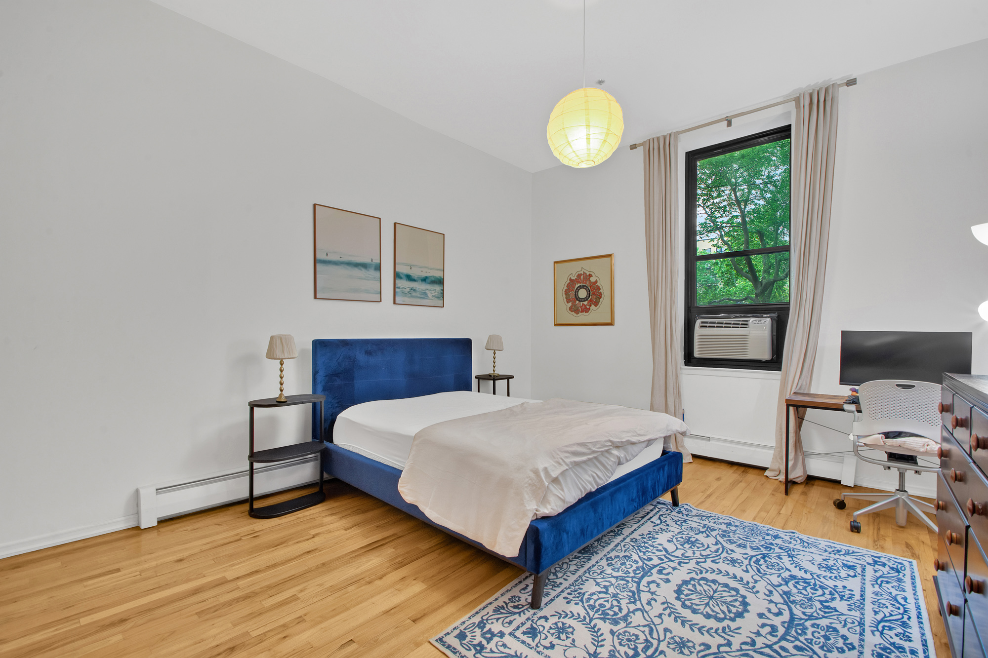372 Dekalb Avenue, Unit 2H Brooklyn, NY 11205 - Photo 6 of 9 a bedroom with a bed and a window