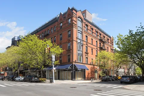 a view of a building and a street
