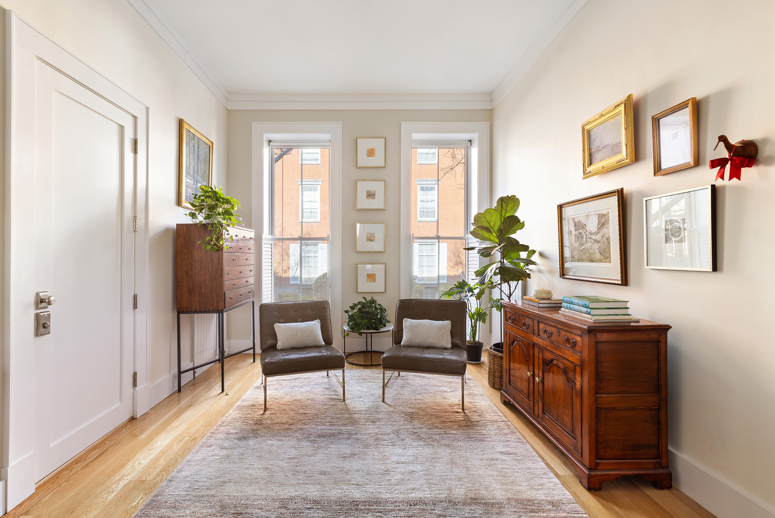 429 Clinton Street, Unit 1 Brooklyn, NY 11231 - Photo 2 of 21 a living room with furniture and a table