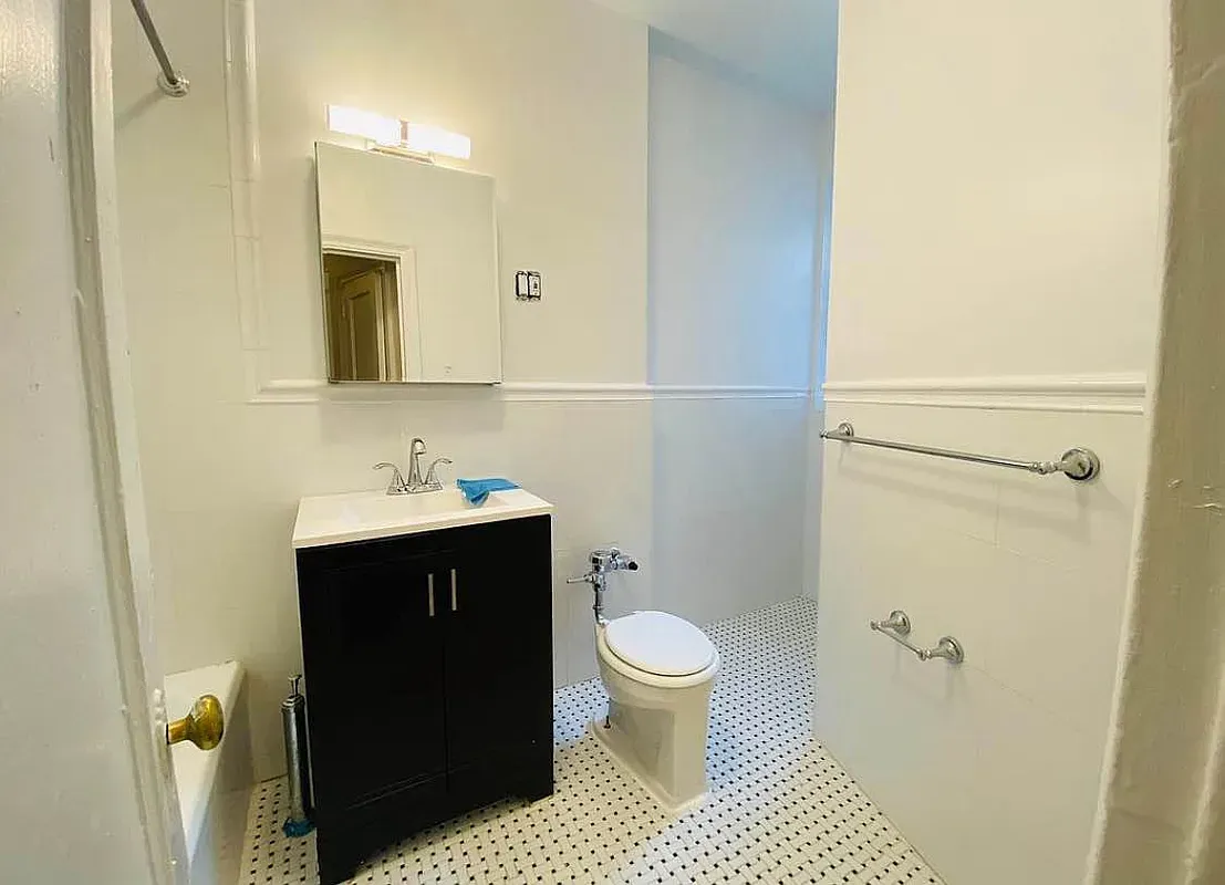 a bathroom with a sink and a toilet