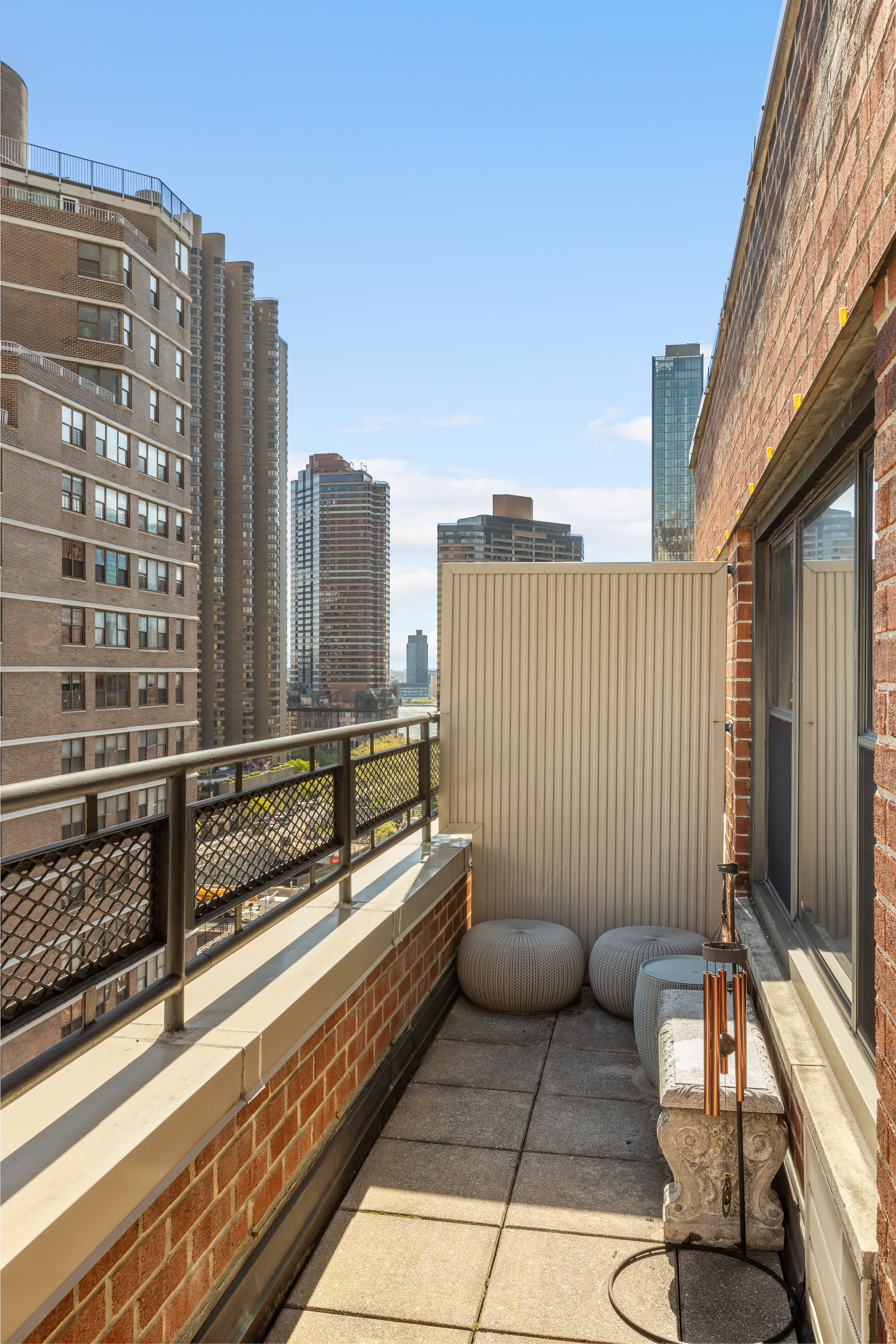 210 East 36th Street, Unit PHC Manhattan, NY 10016 - Photo 8 of 13 a view of balcony with couch