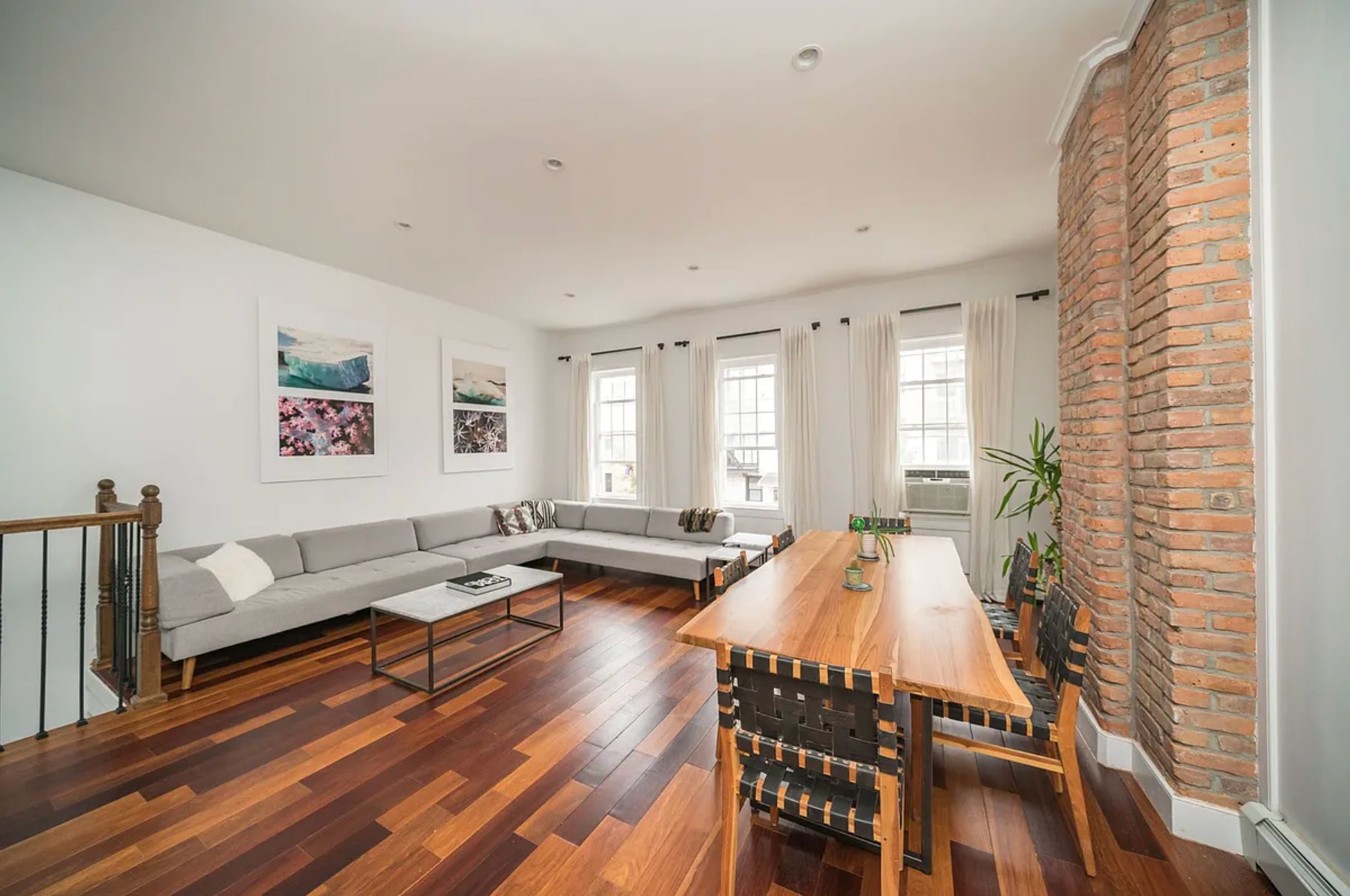 29 Melrose Street, Unit 2 Brooklyn, NY 11206 - Photo 12 of 13 a living room with furniture and a large window