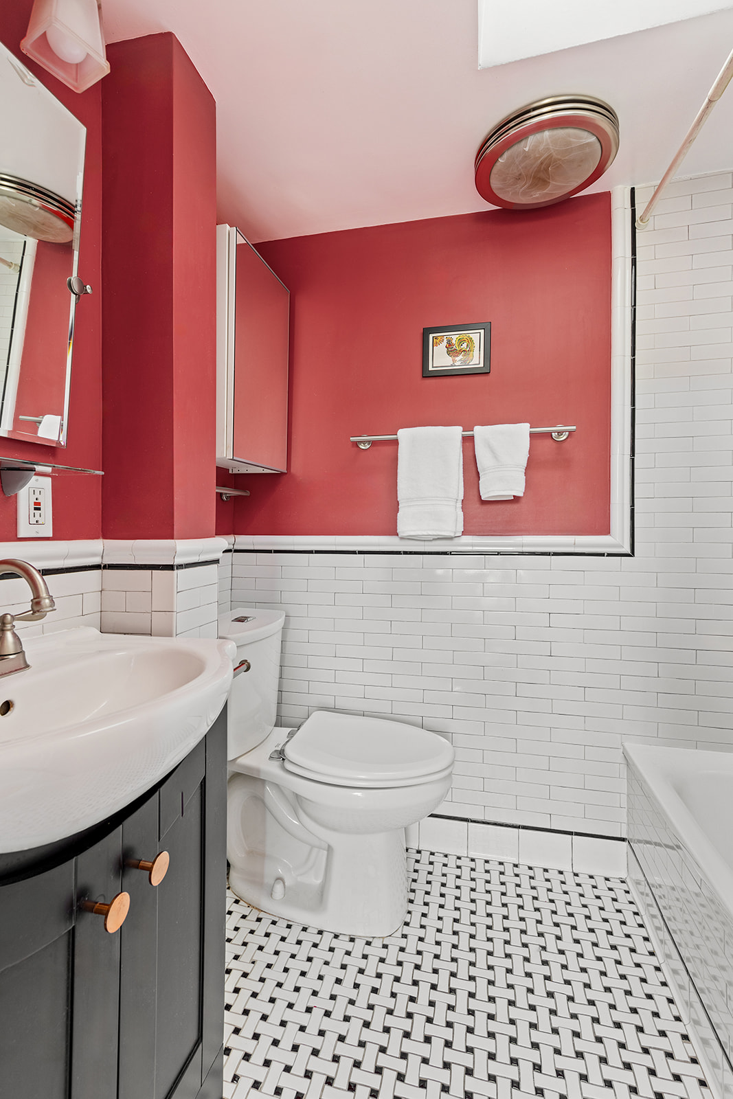 334 Union Street, Unit 3 Brooklyn, NY 11231 - Photo 6 of 10 a bathroom with a sink a toilet and mirror