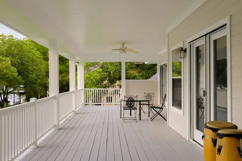 a view of a balcony with chairs