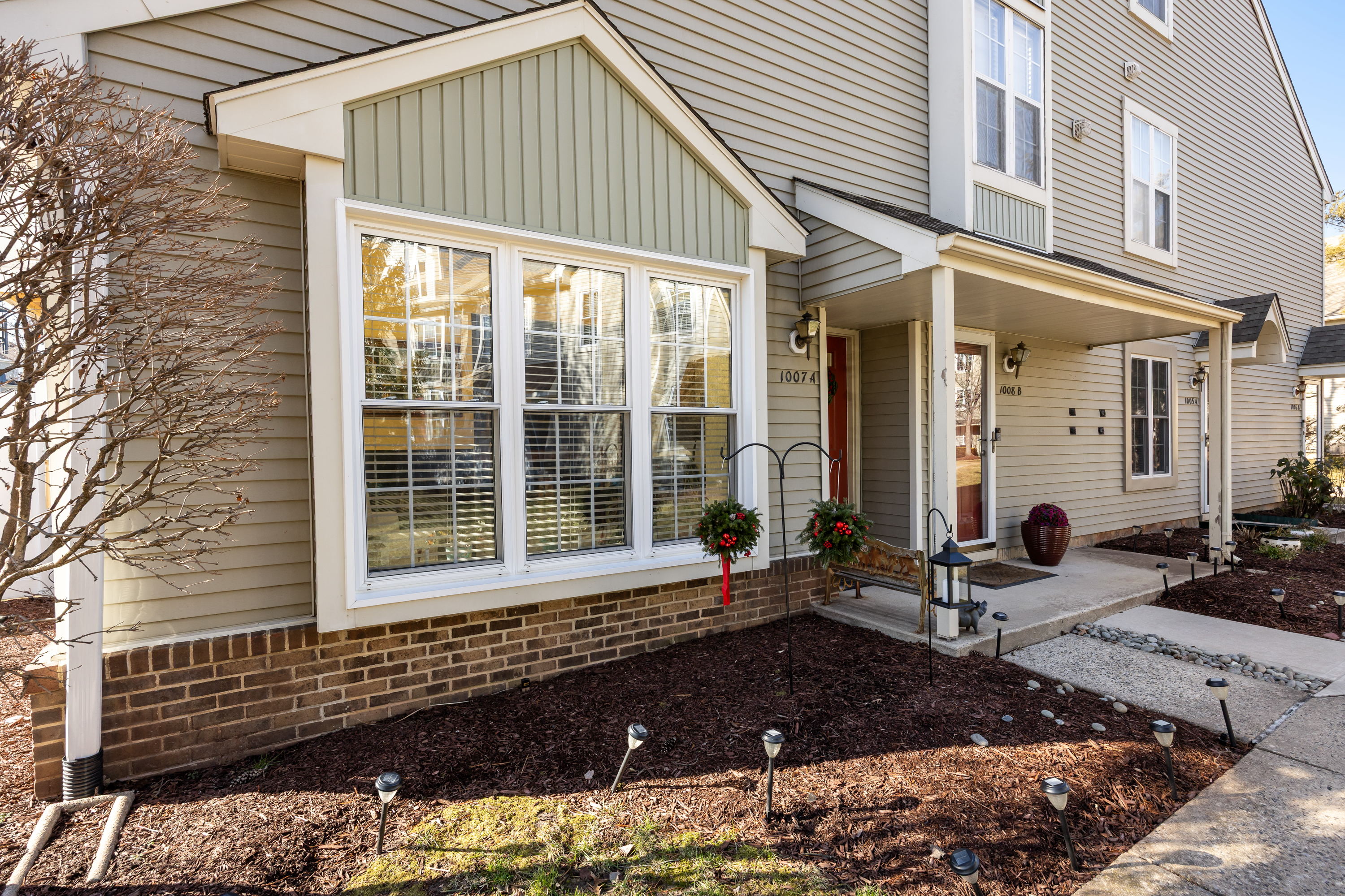 1007 A Yarmouth Lane Mount Laurel, NJ 08054 - Photo 2 of 27 a front view of a house with a large window