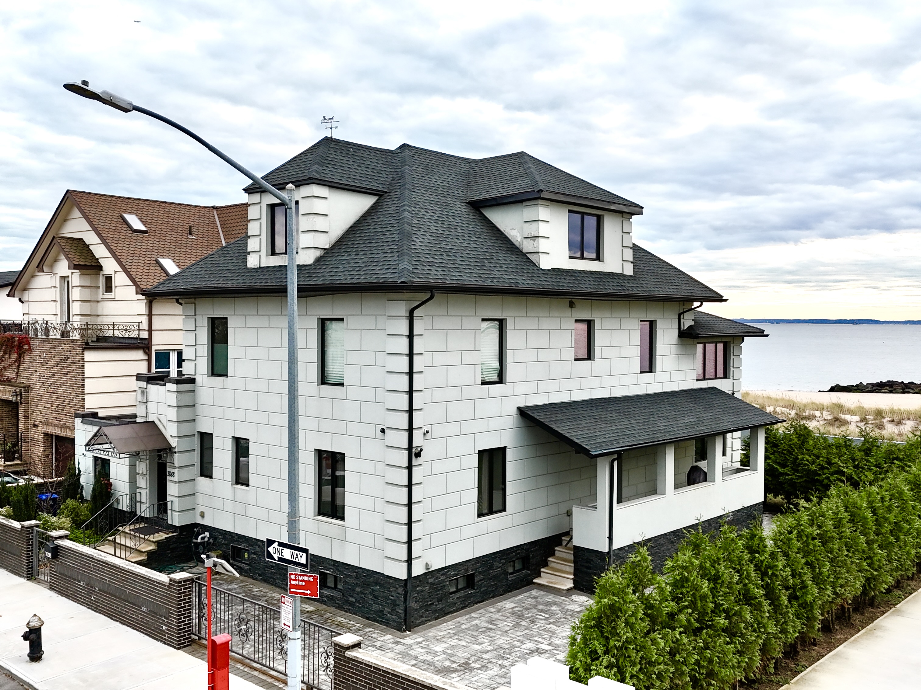 3848 Atlantic Avenue Brooklyn, NY 11224 - Photo 6 of 29 a front view of a house with plants