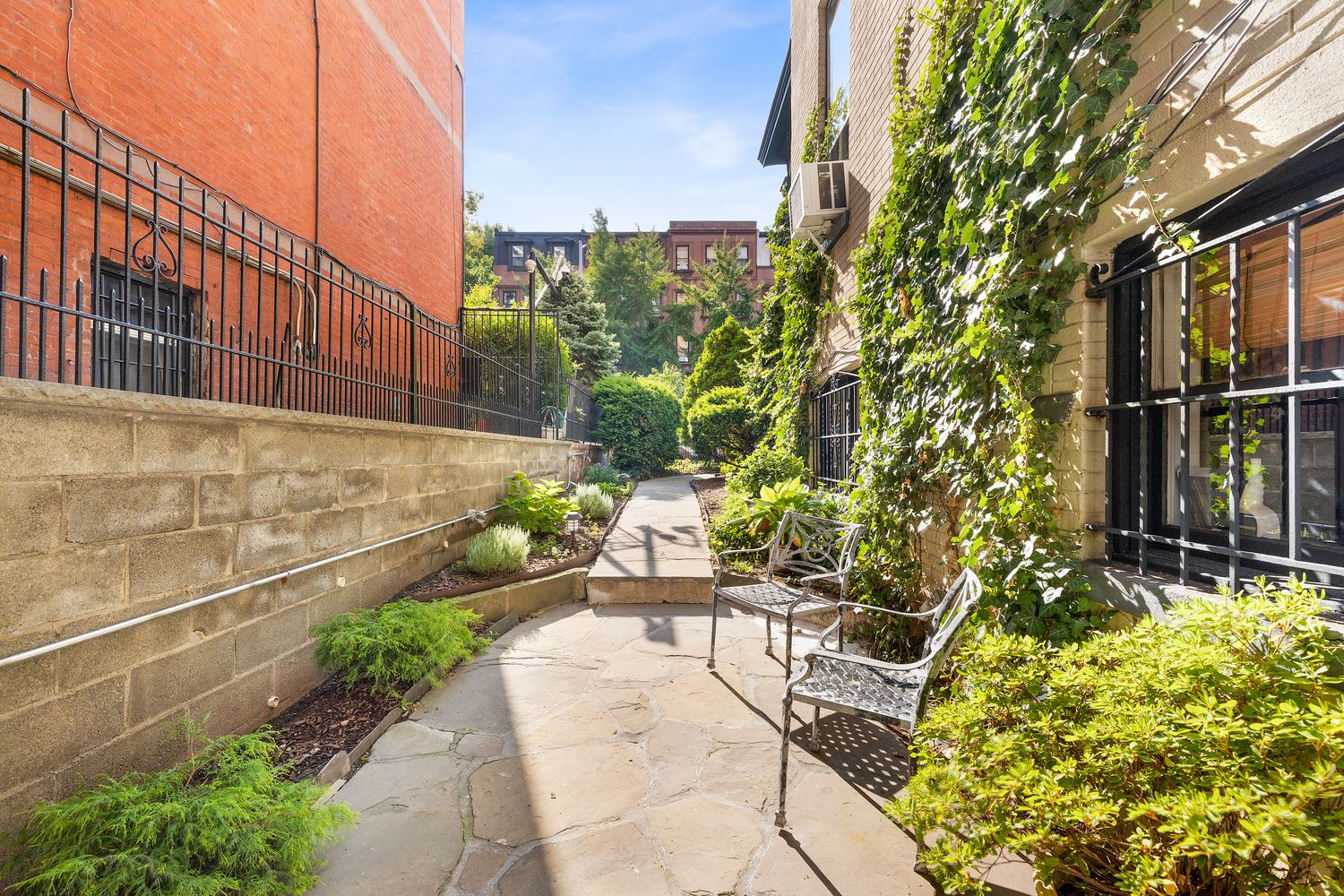 315 Washington Avenue Brooklyn, NY 11205 - Photo 28 of 38 a view of a chair and table in the backyard