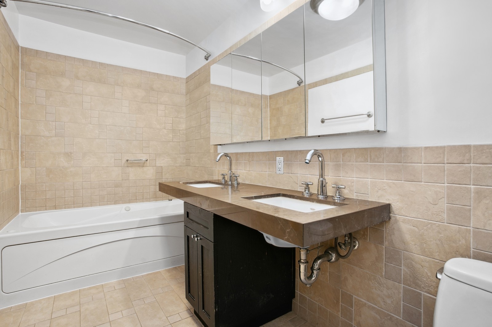 145 Park Place, Unit 4E Brooklyn, NY 11217 - Photo 8 of 15 a bathroom with a sink a toilet and shower