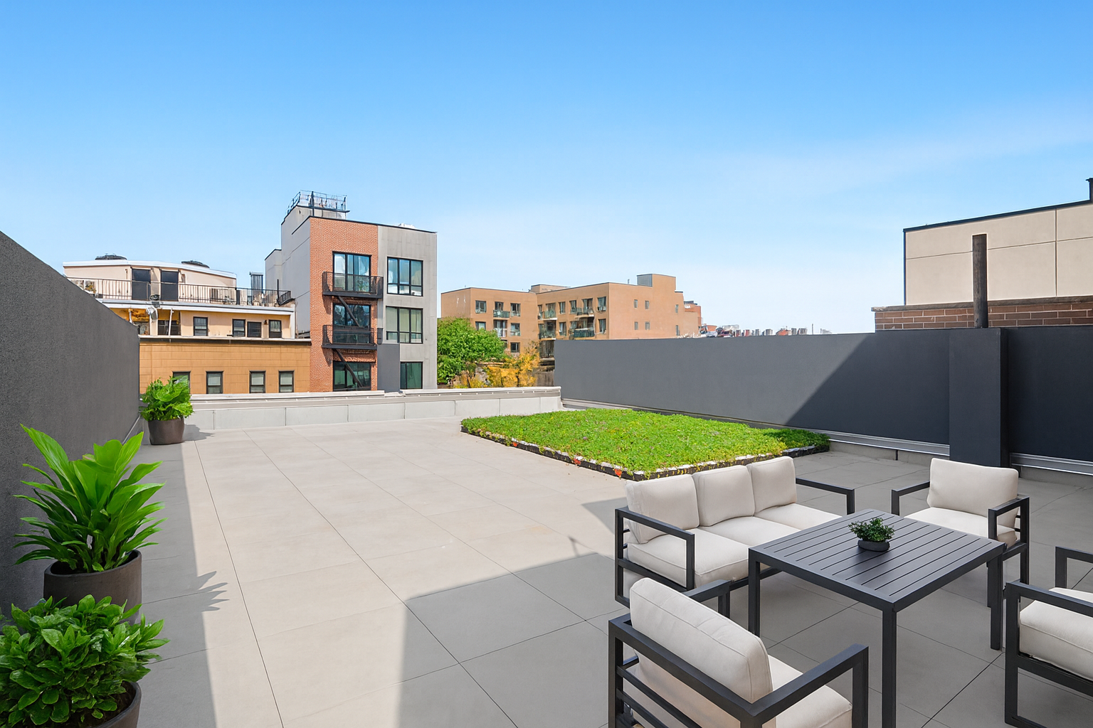 212 Montrose Avenue, Unit 4R Brooklyn, NY 11206 - Photo 10 of 12 a view of a city from a patio