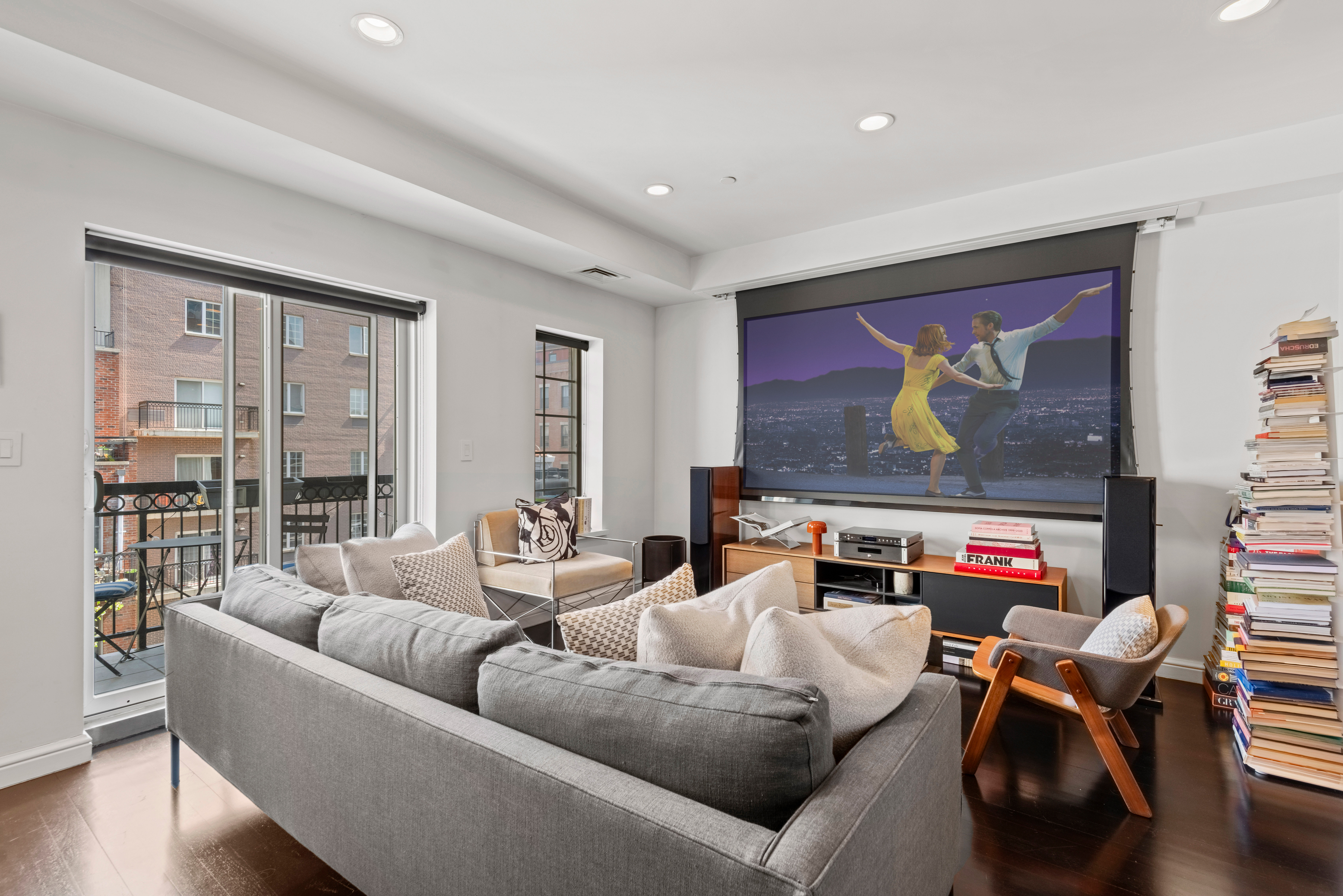 347 3rd Street, Unit C4A Brooklyn, NY 11215 - Photo 1 of 11 a living room with furniture and a flat screen tv