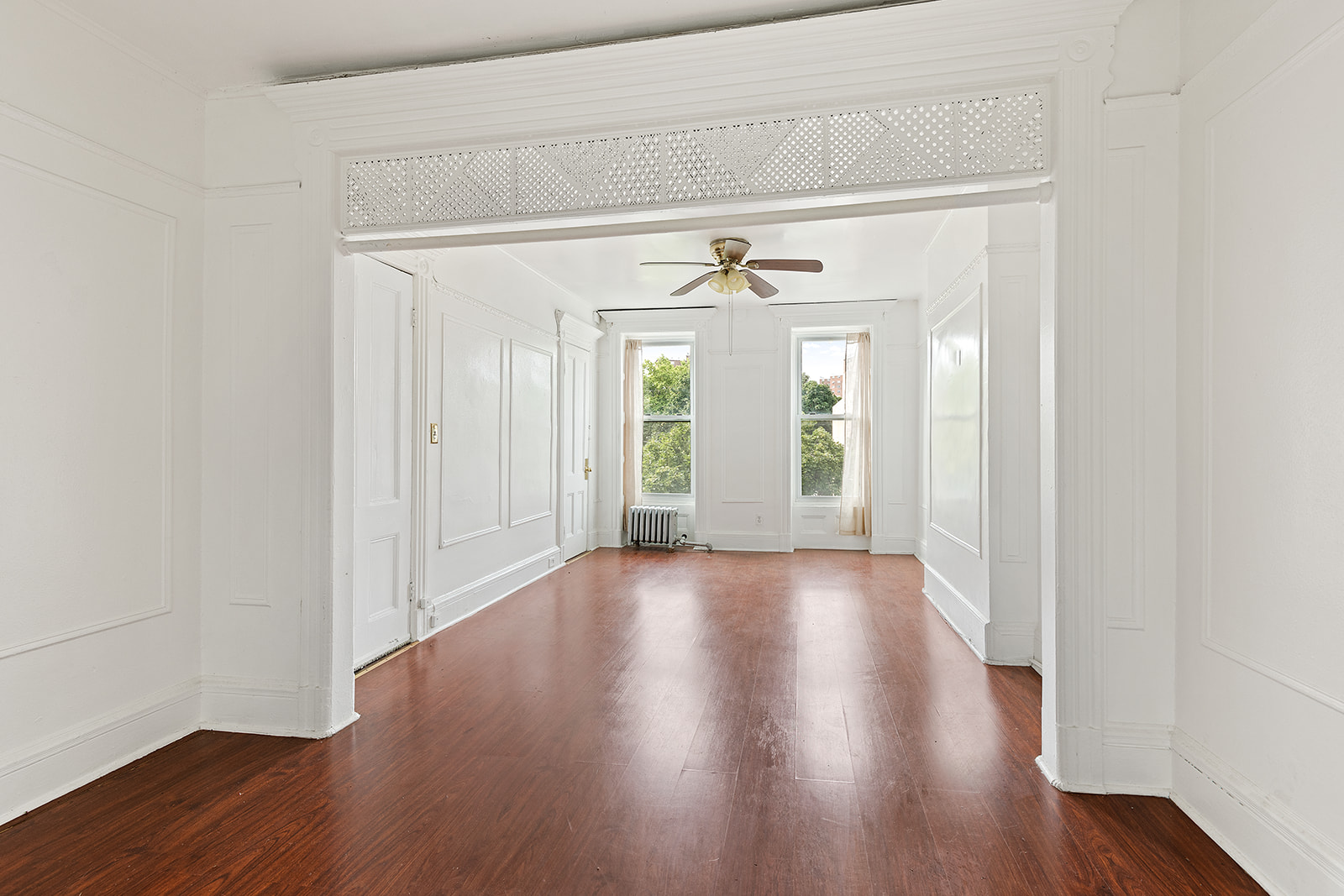 1599 A Pacific Street Brooklyn, NY 11213 - Photo 6 of 14 a view of a hallway with wooden floor