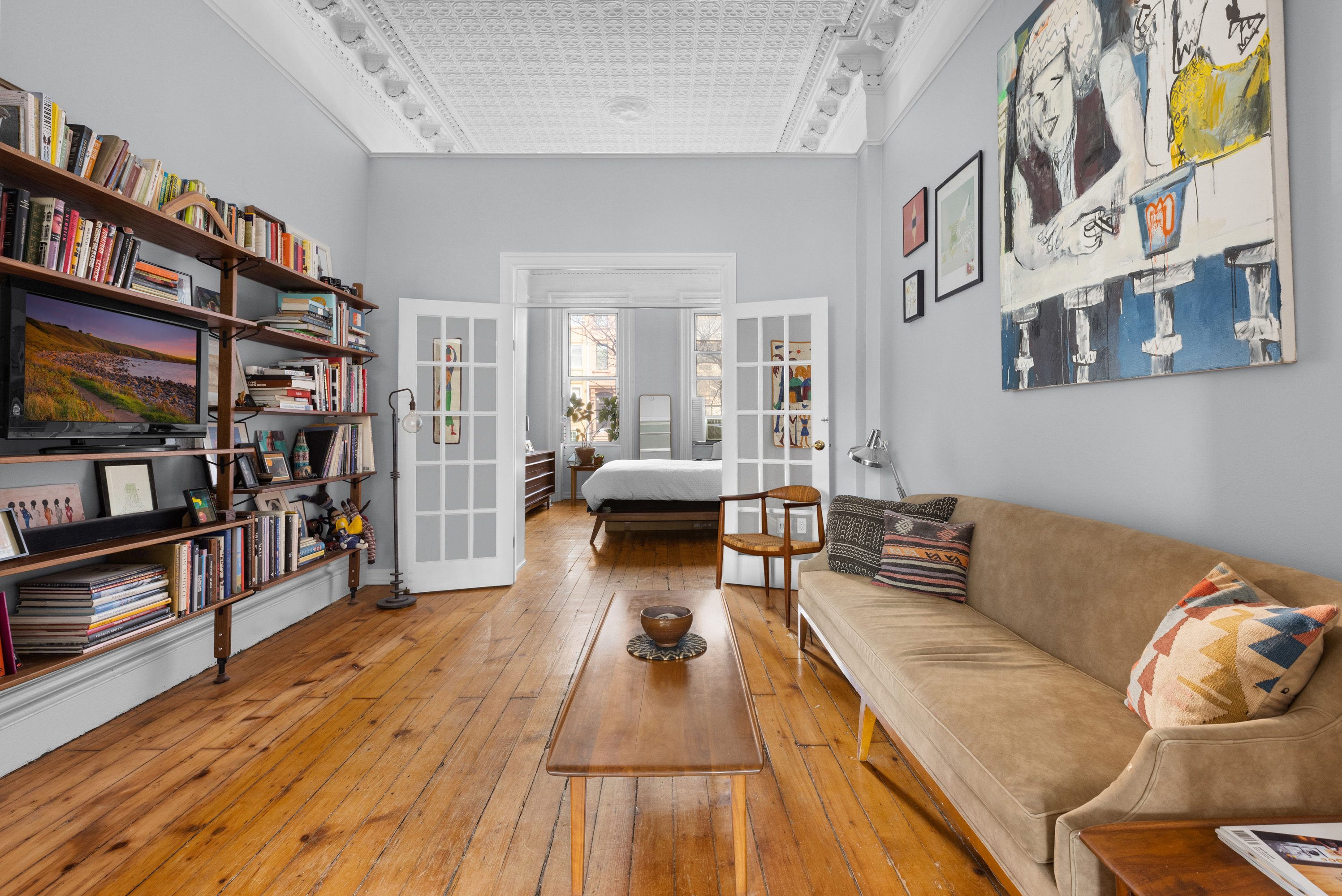 96 2nd Place Brooklyn, NY 11231 - Photo 3 of 14 a living room with furniture and a book shelf