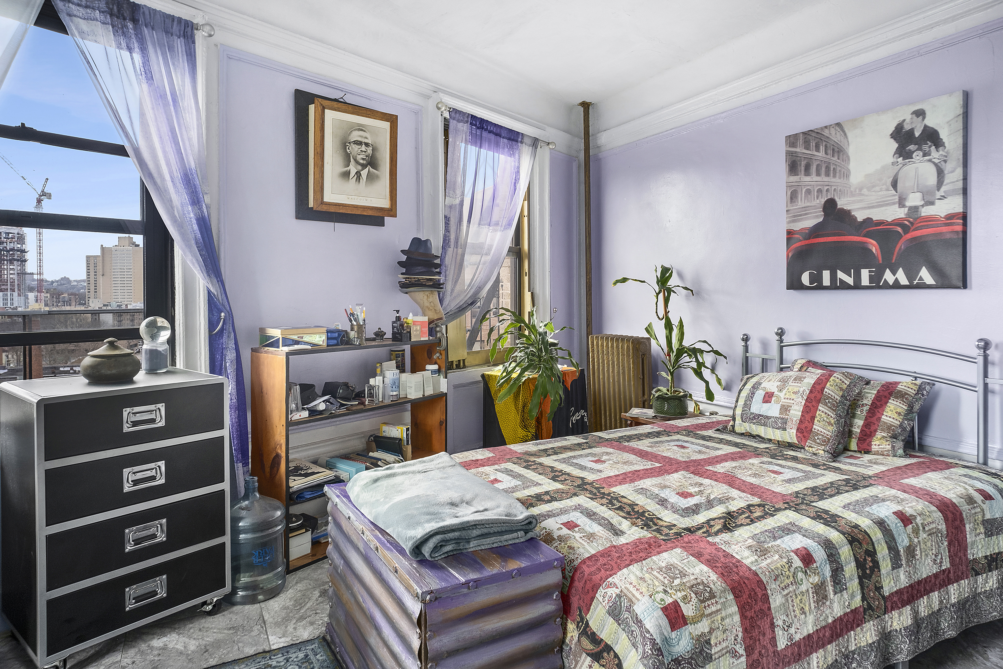 41 Convent Avenue, Unit 4L Manhattan, NY 10027 - Photo 5 of 13 a bedroom with a bed and a cabinets