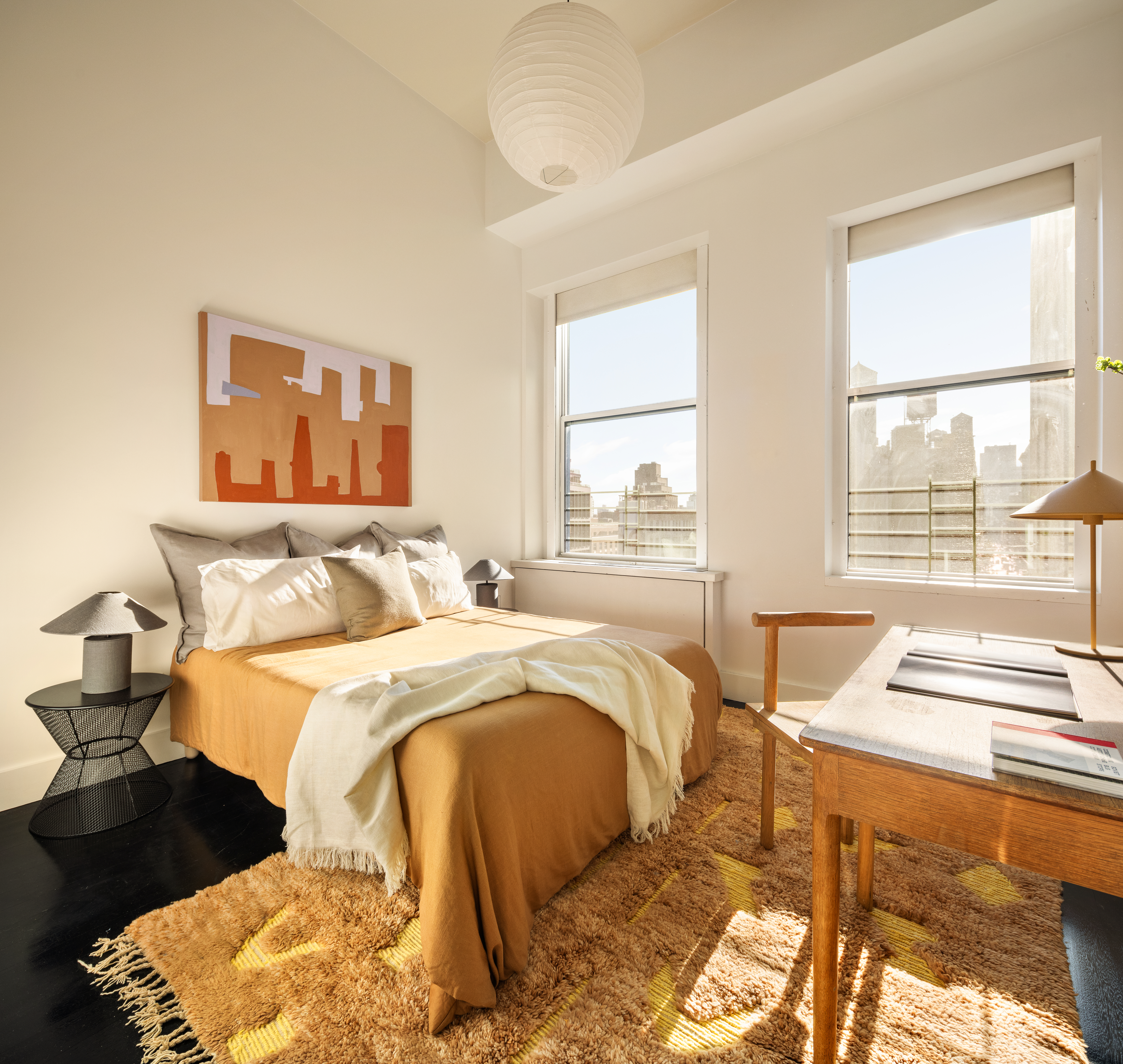 7 Bond Street, Unit PHAB Manhattan, NY 10012 - Photo 12 of 20 a bedroom with a bed and wooden floor