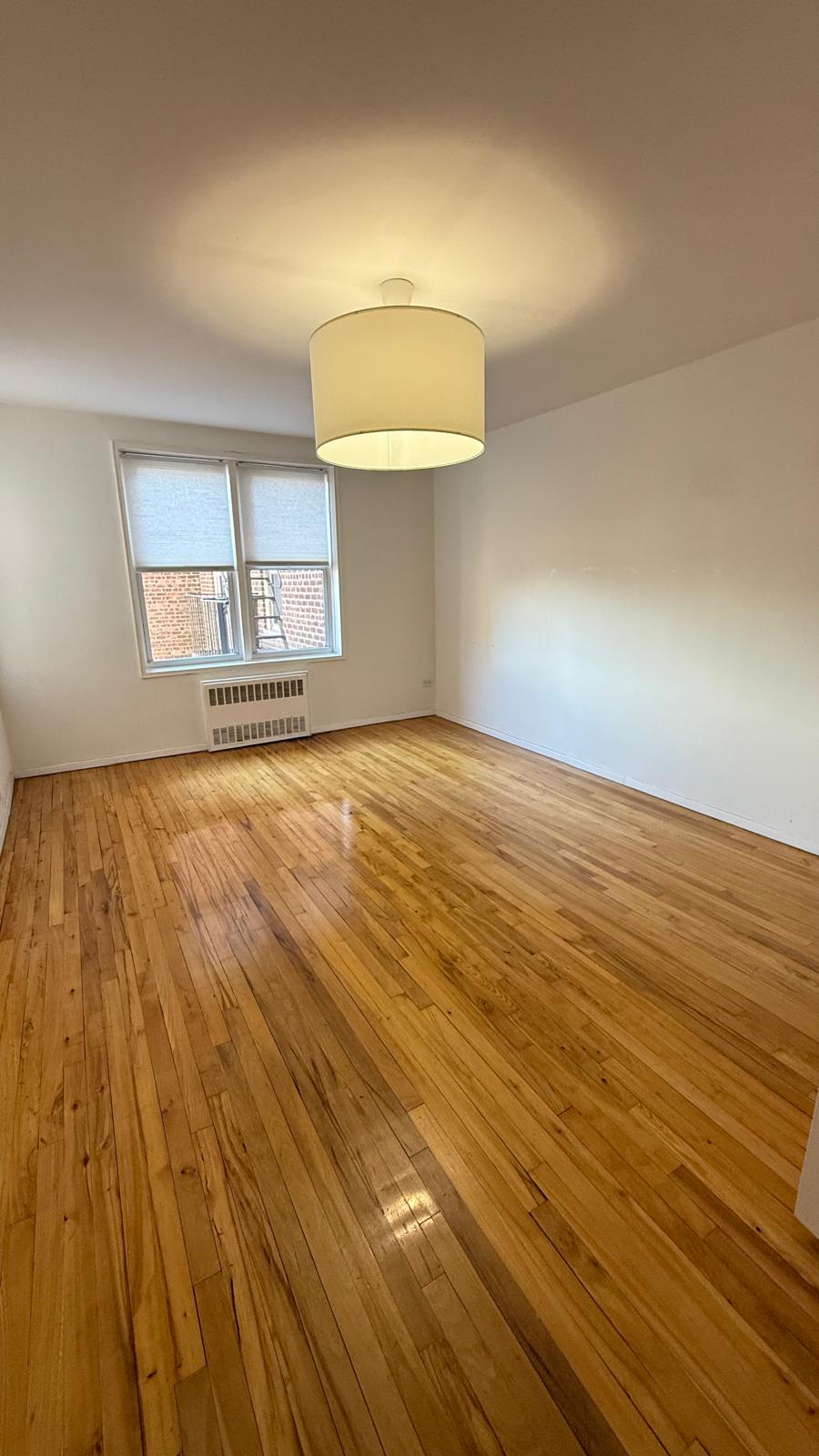 2665 Homecrest Avenue, Unit 4ZC Brooklyn, NY 11235 - Photo 8 of 9 a view of a room with wooden floor