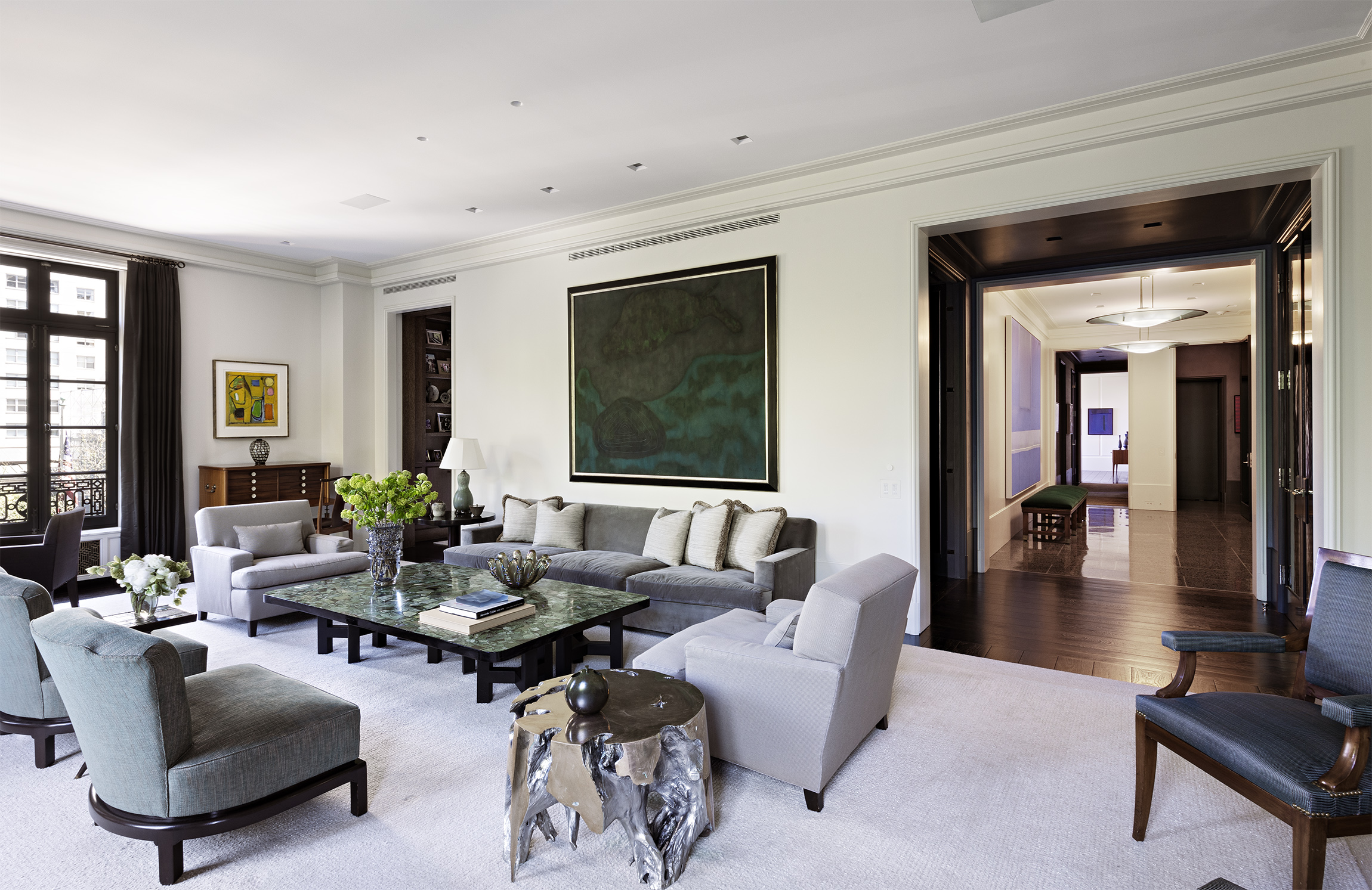 2 East 70th Street, Unit 4A Manhattan, NY 10021 - Photo 2 of 17 a living room with furniture and wooden floor